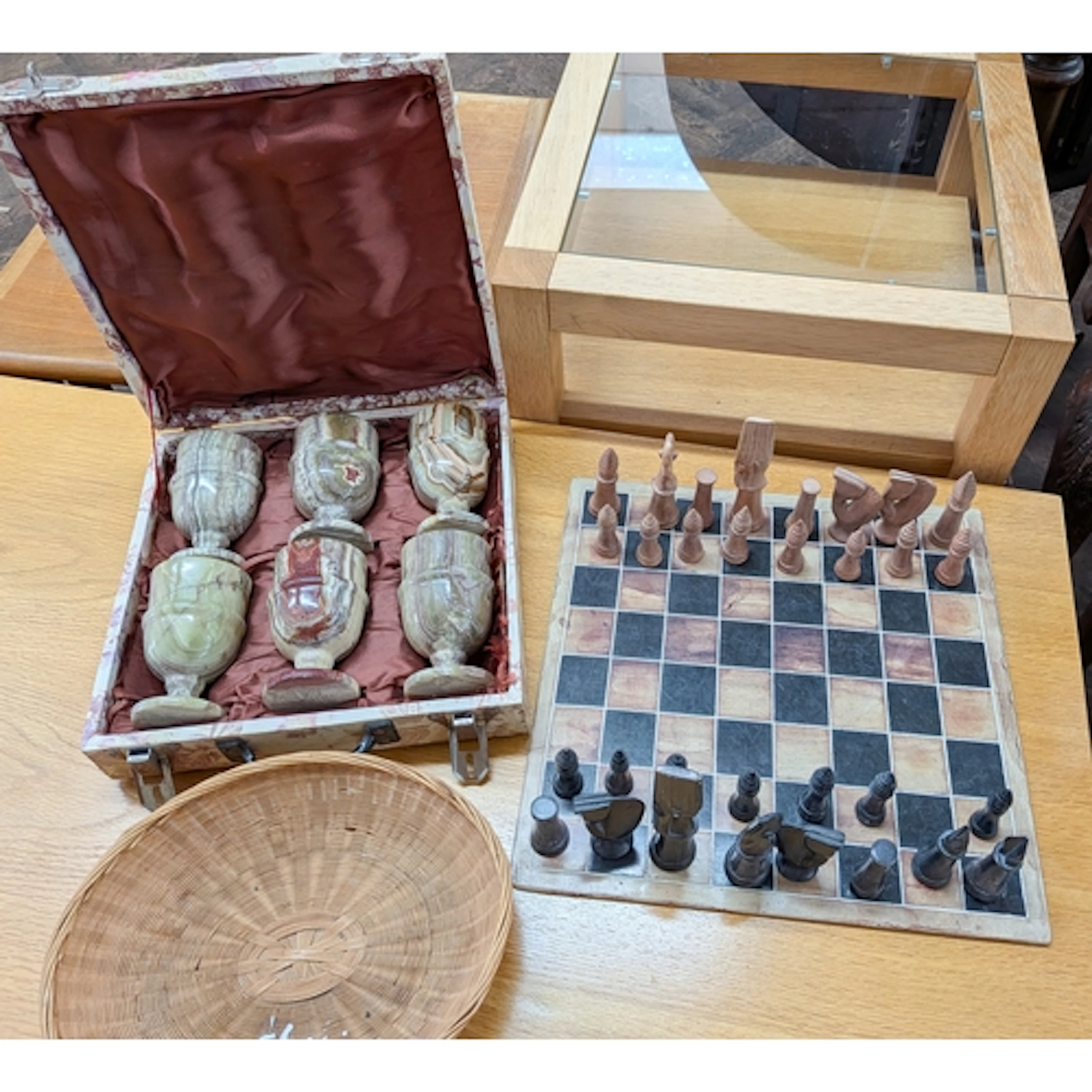 Six onyx goblets in case and a chess set with board