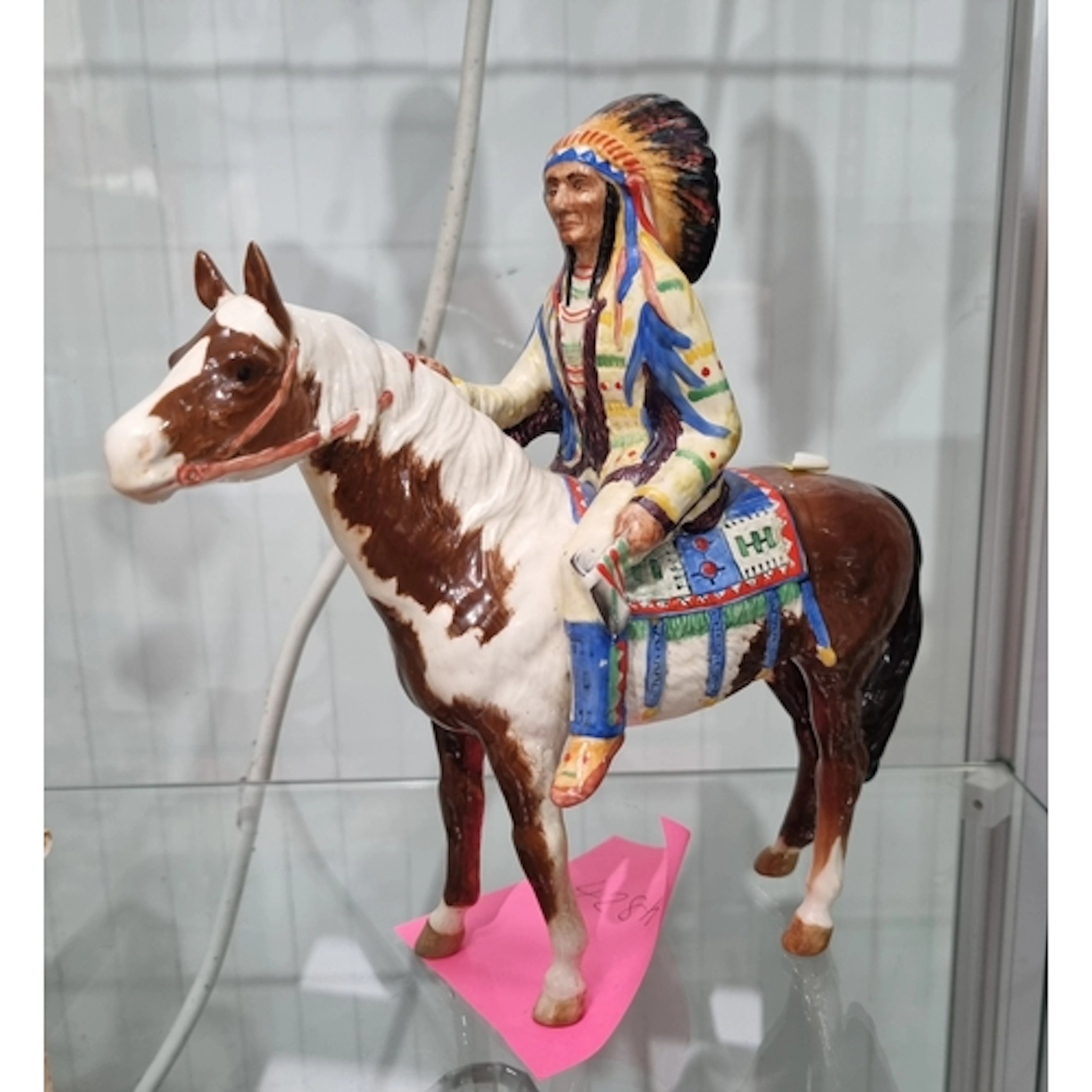 A Beswick Model of a native North American Indian on horseba...
