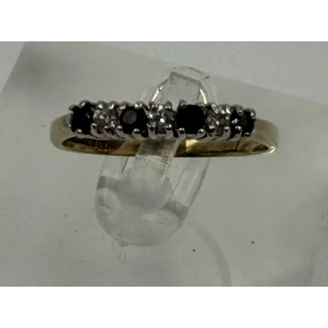 A gold-plated silver Sapphire and CZ half eternity ring hall...