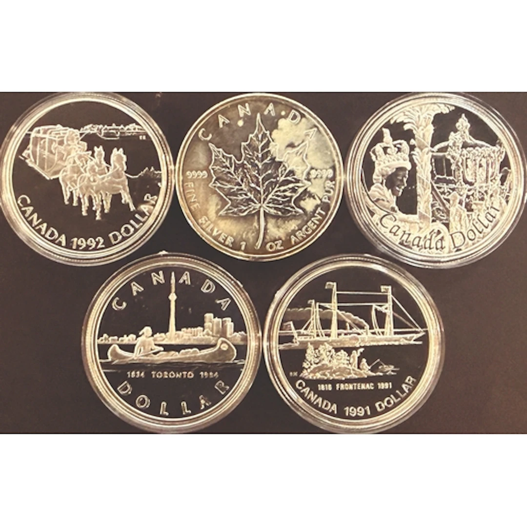 A group of five Canadian silver coins, comprising 1984, 1991...