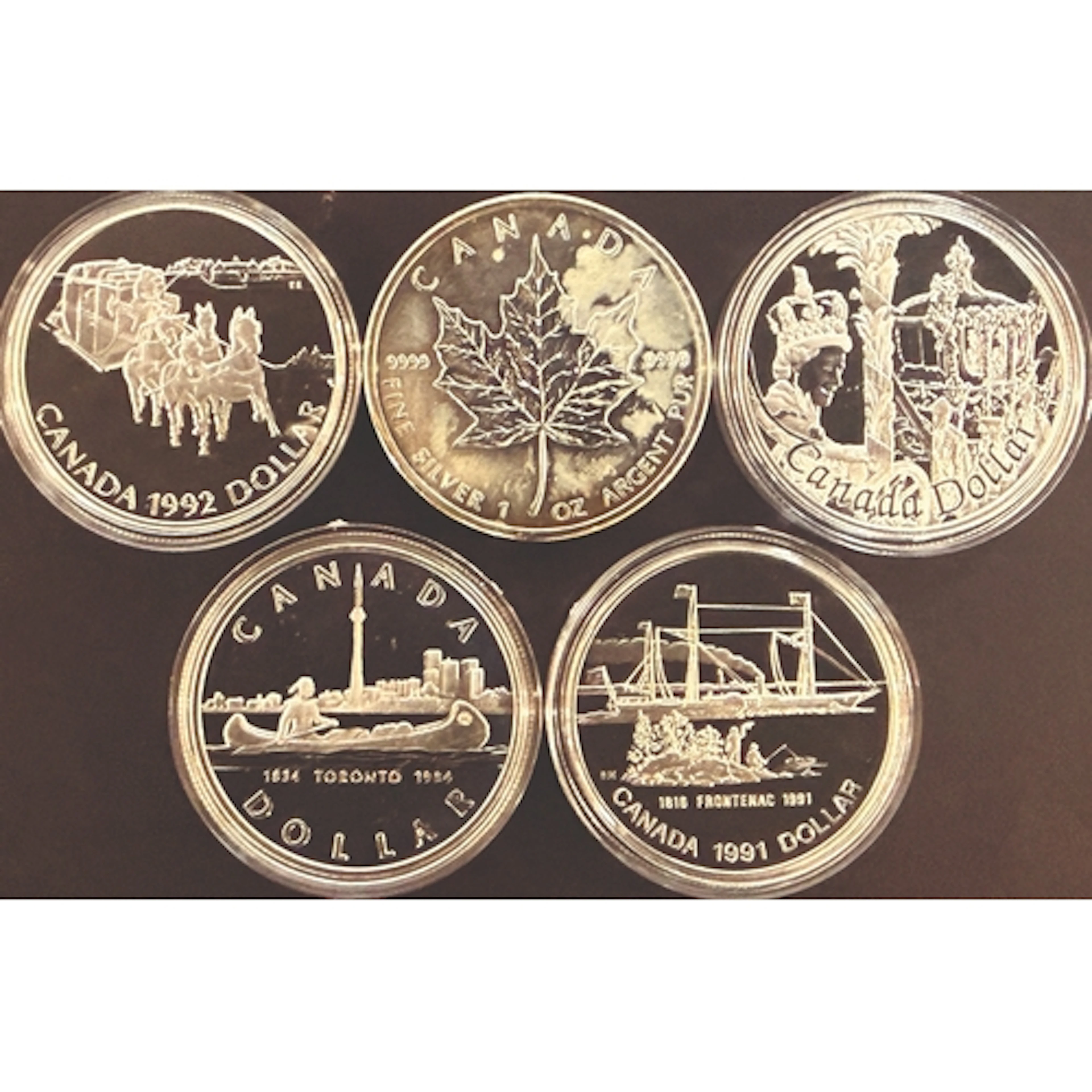 A group of five Canadian silver coins, comprising 1984, 1991...