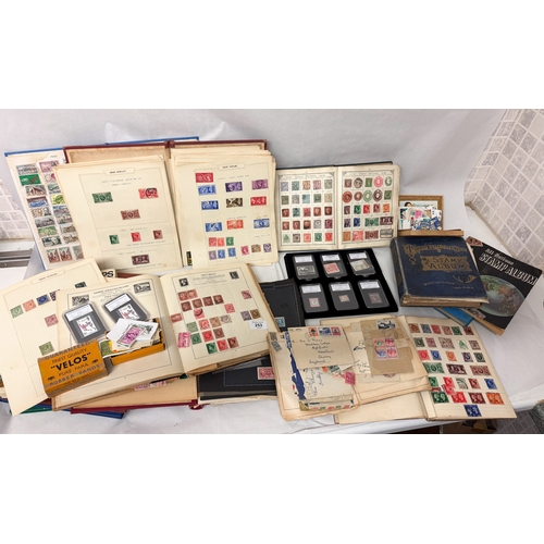 Over ten albums of British, commonwealth and world stamps an...