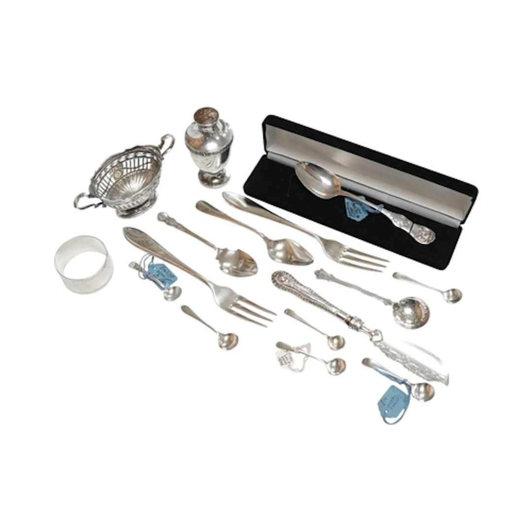 A small collection of silver and white metal items, includin...