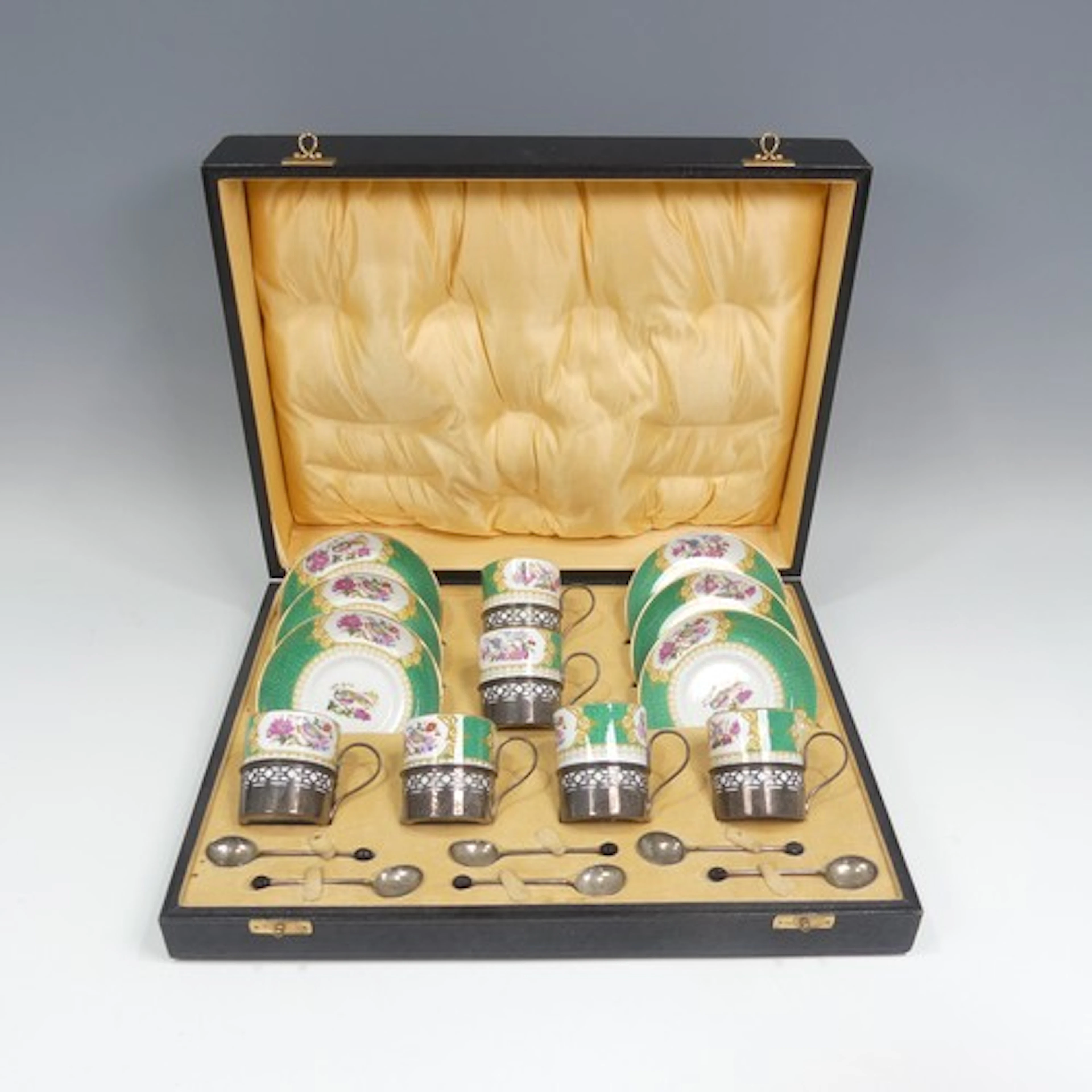 A cased set of six silver mounted Coffee Cans and Saucers, t...
