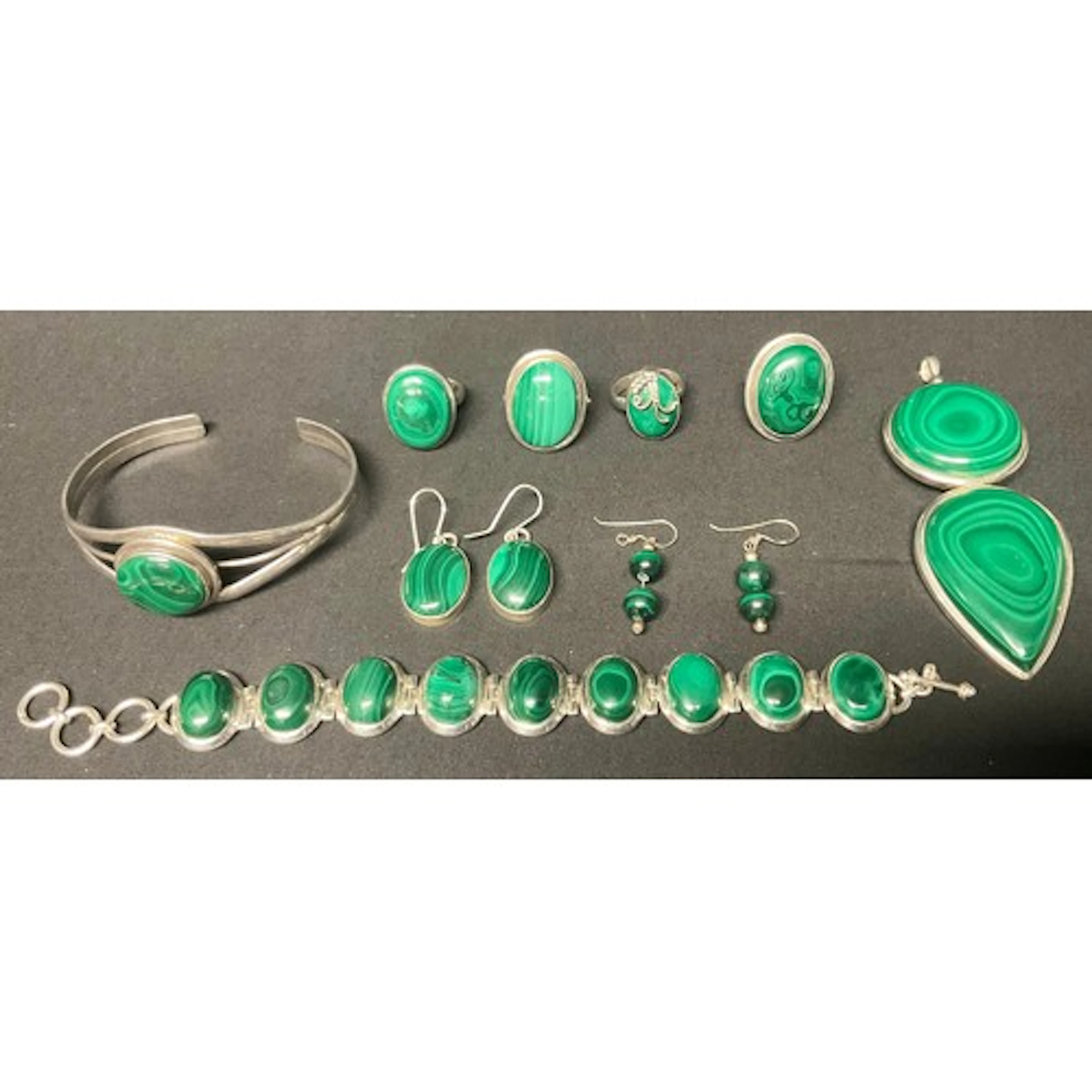 A malachite and silver metal nine cabochon panel bracelet, s...