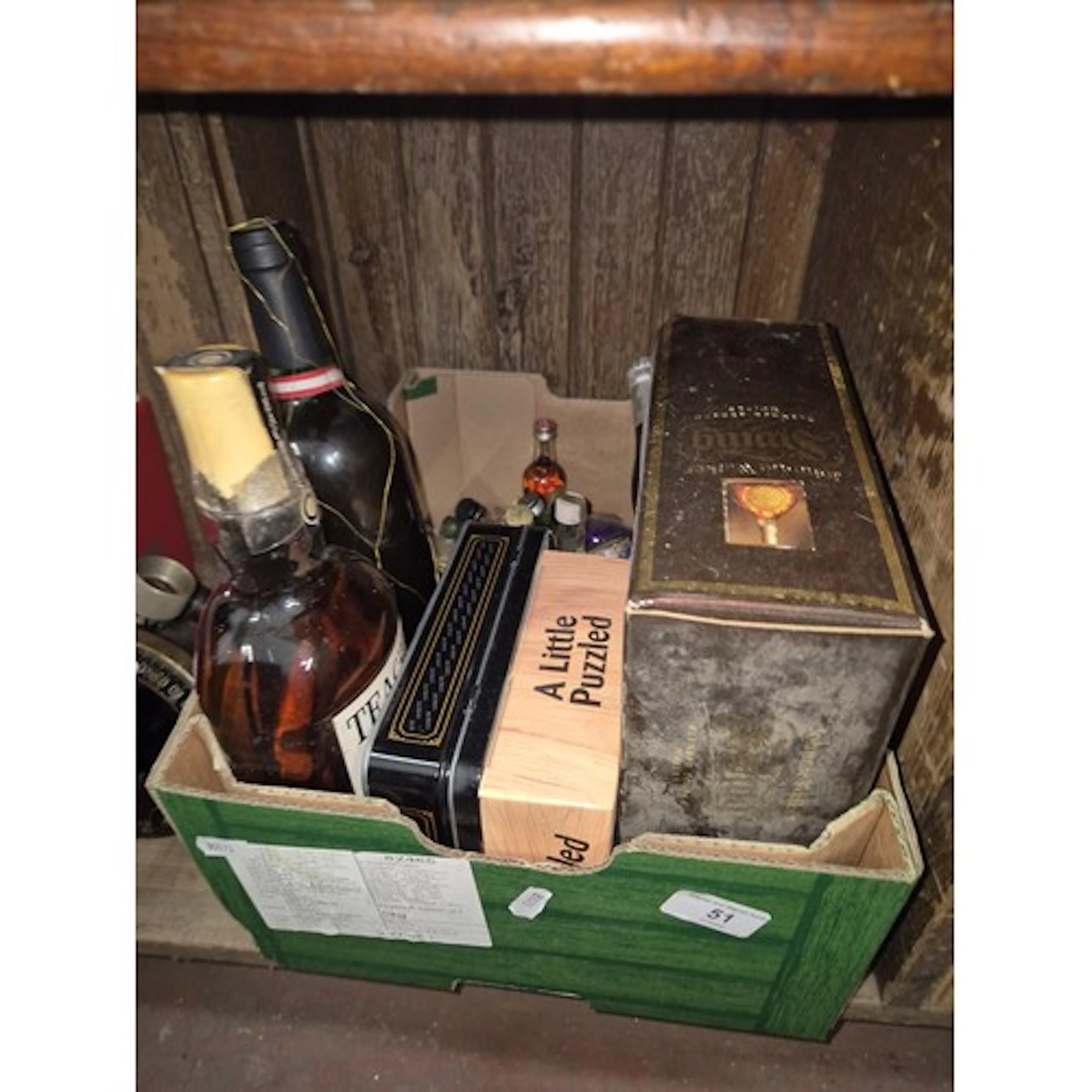 A box of alcoholic miniatures, together with a bottle of Tea...