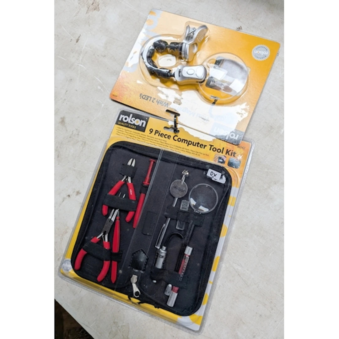 A new nine piece computer toolkit and a magnifier