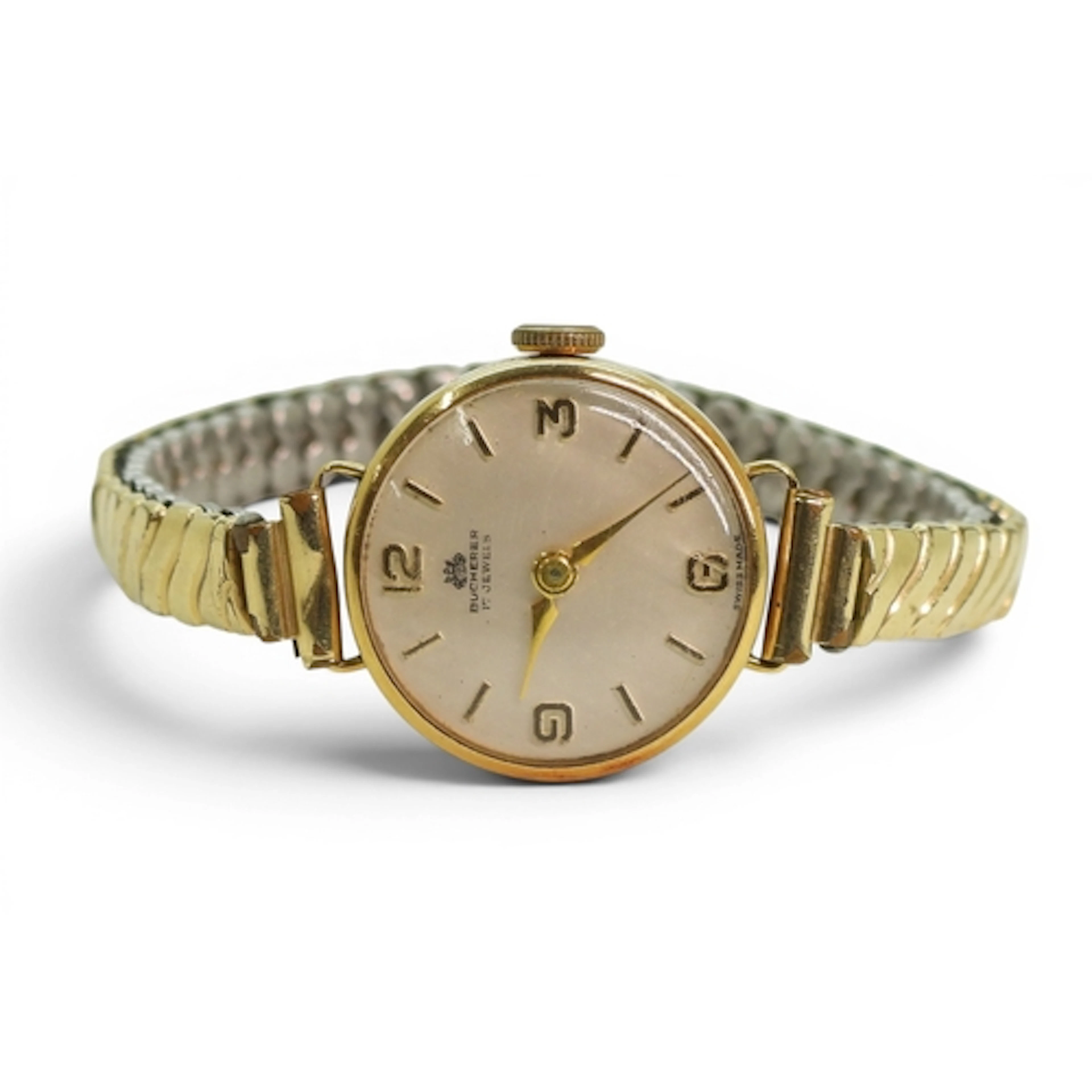 An 18k gold Bucherer ladies watch head, with a gold plated s...