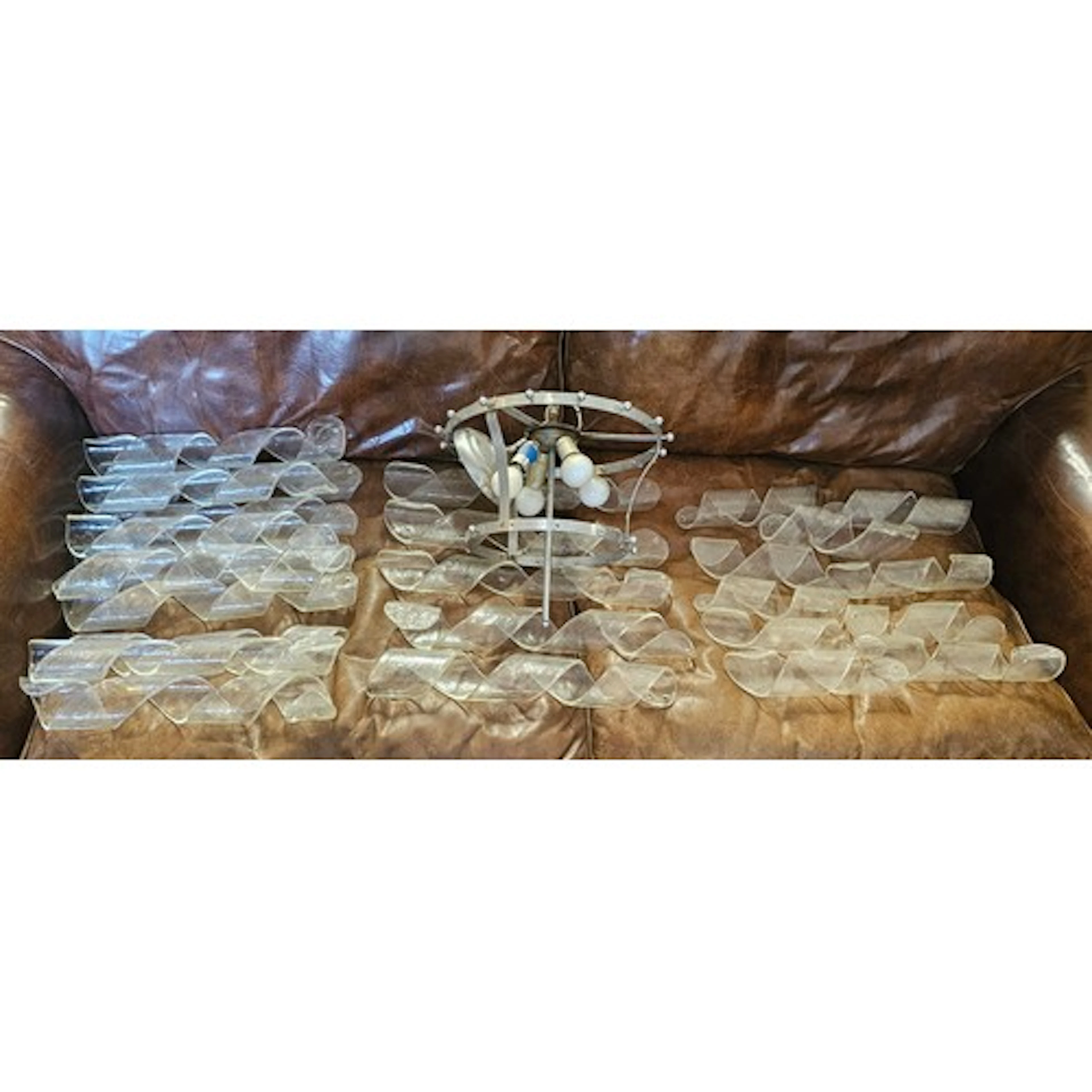 A MID CENTURY ITALIAN CHANDELIER The two graduated tiers hun...