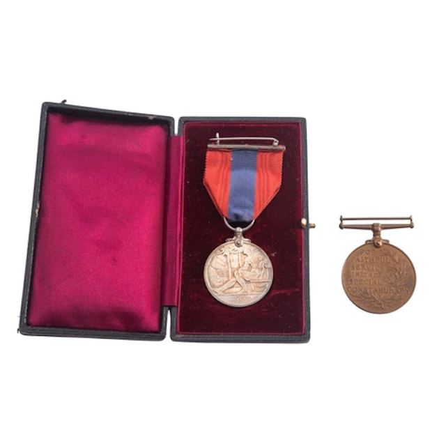 A George V Imperial Service Medal in case of issue to Thomas...