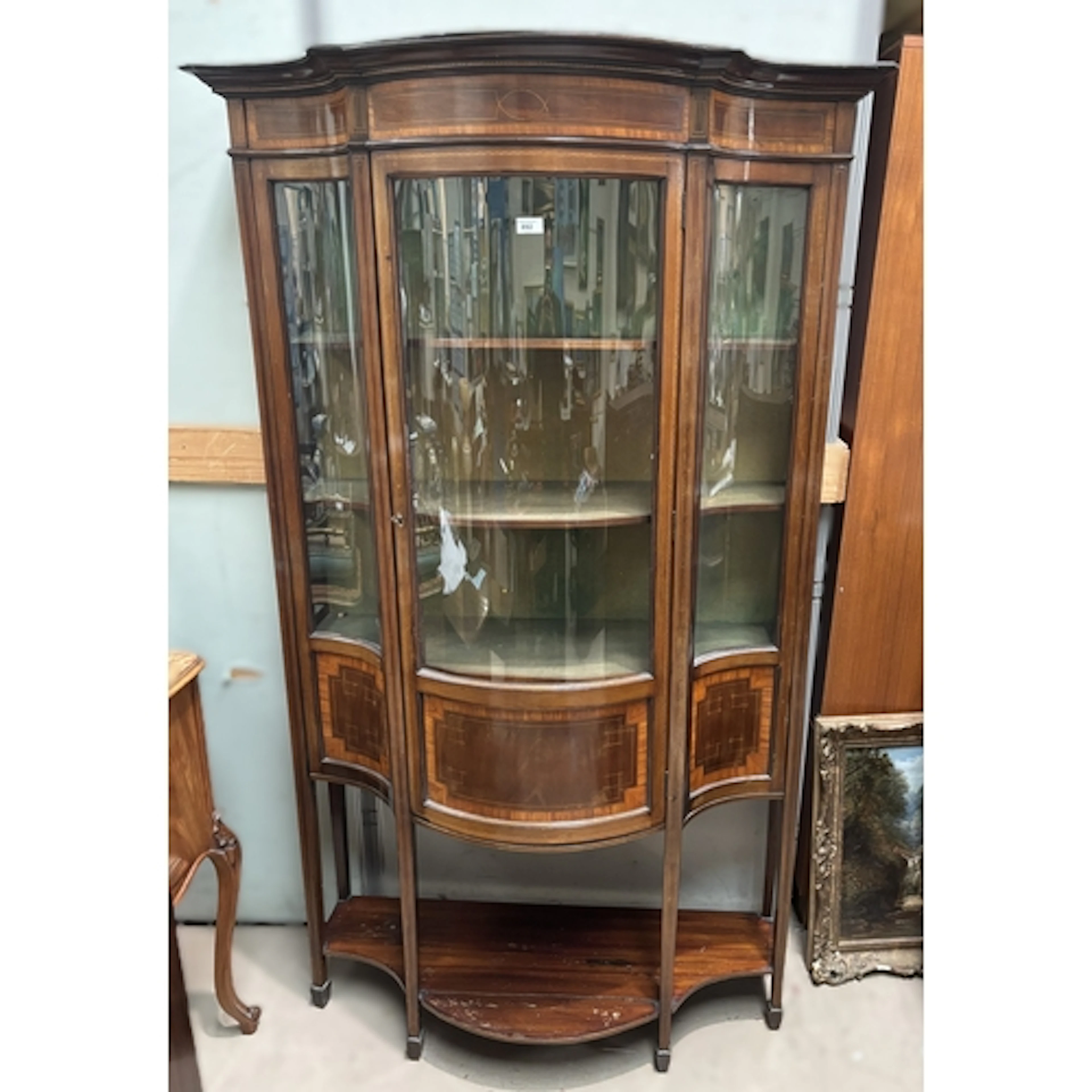 A late 19th/early 20th century serpentine front inlaid and c...