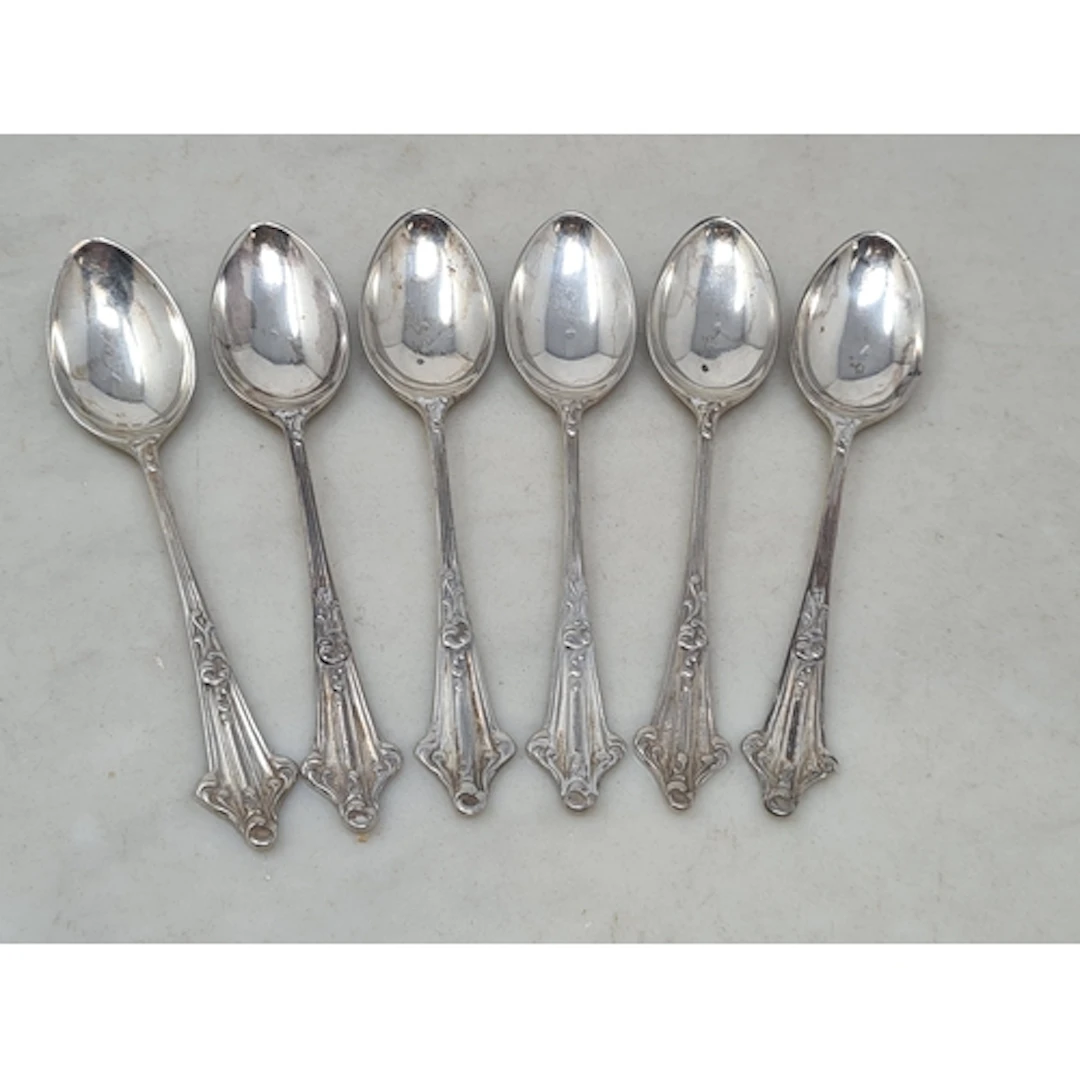 Six George VI silver Coffee Spoons with ornate handles, Shef...