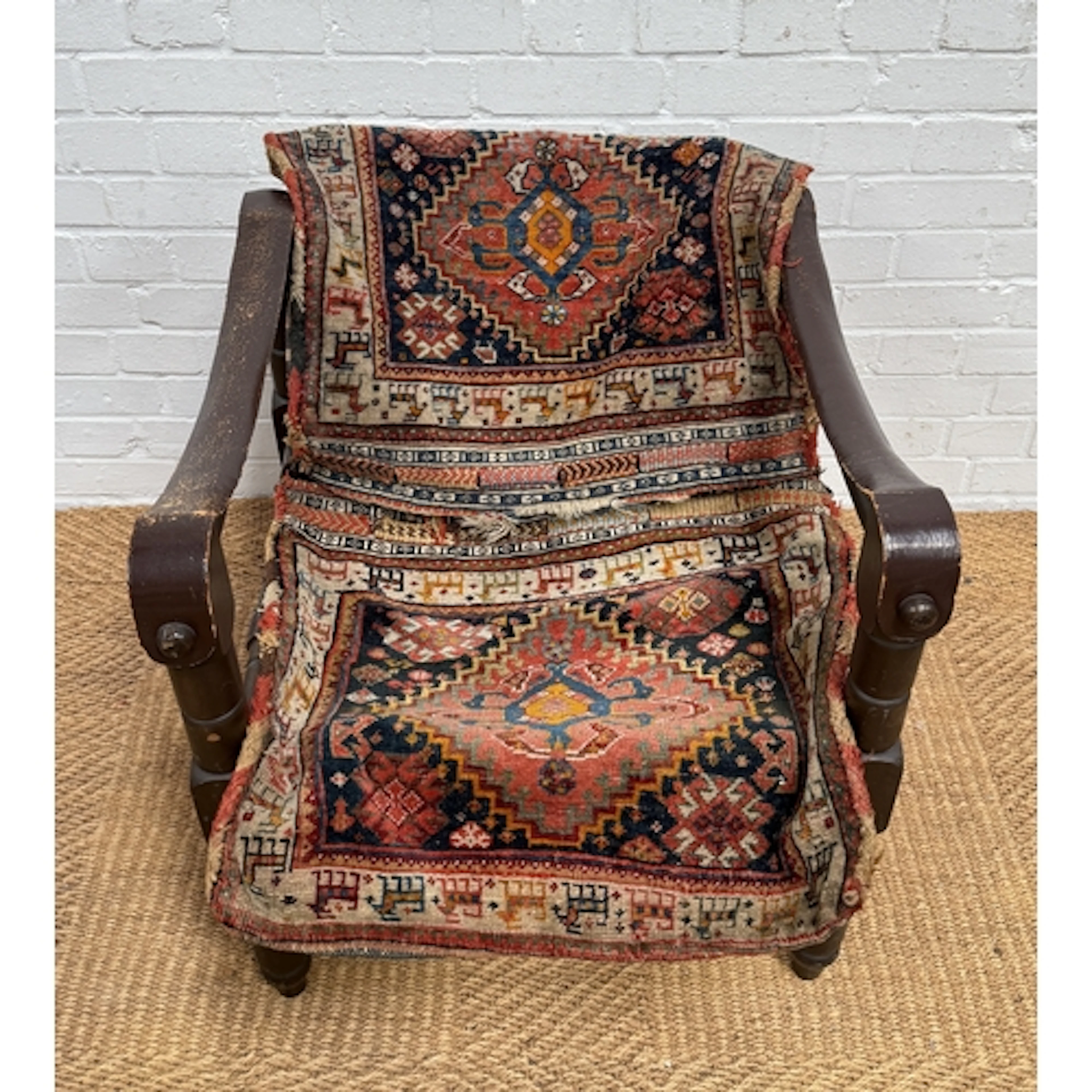 A MOROCCAN SADDLE CHAIR, WITH CARPET COVER 67cm x 60cm x 60c...