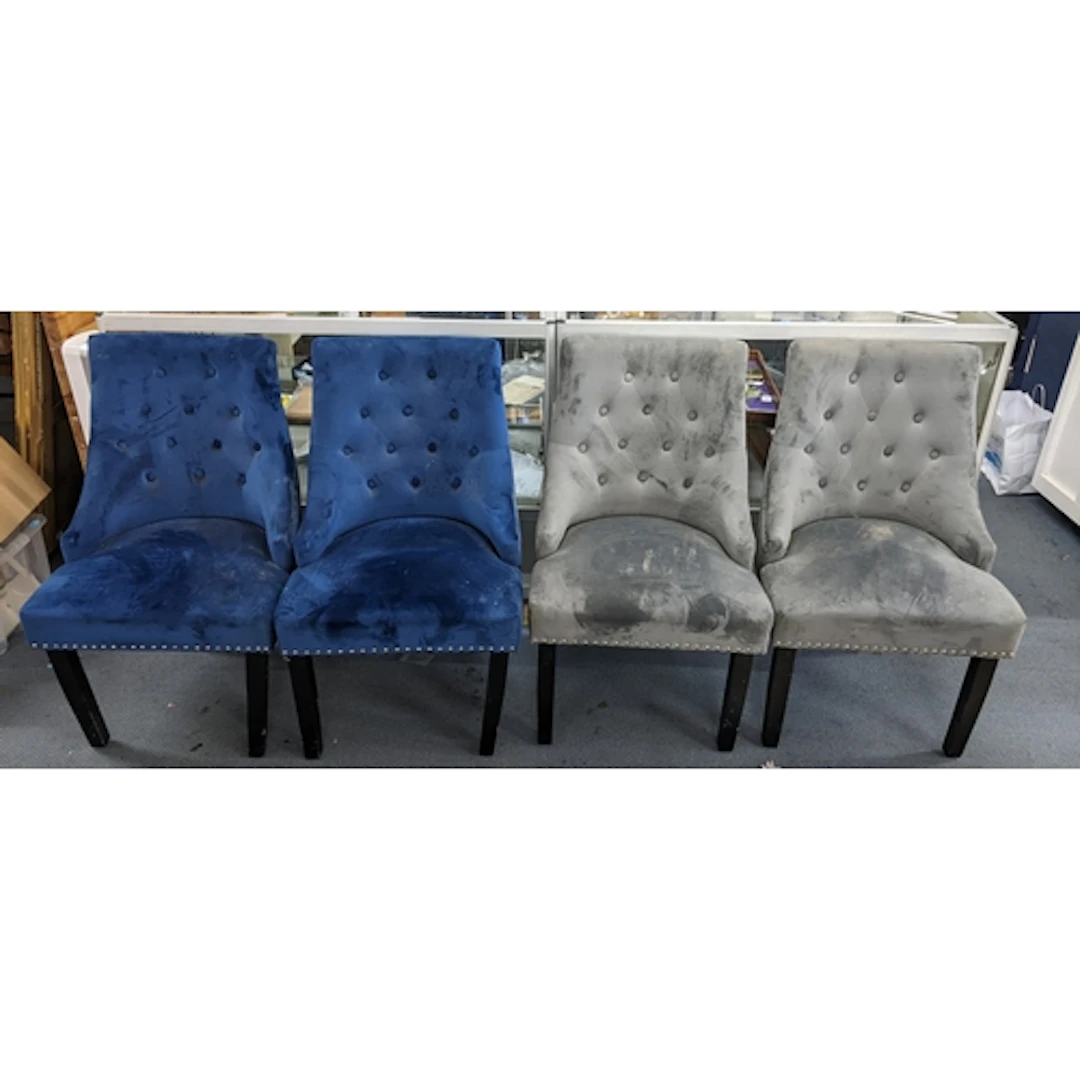 Four modern Mmilo chairs, upholstered in grey and blue butto...