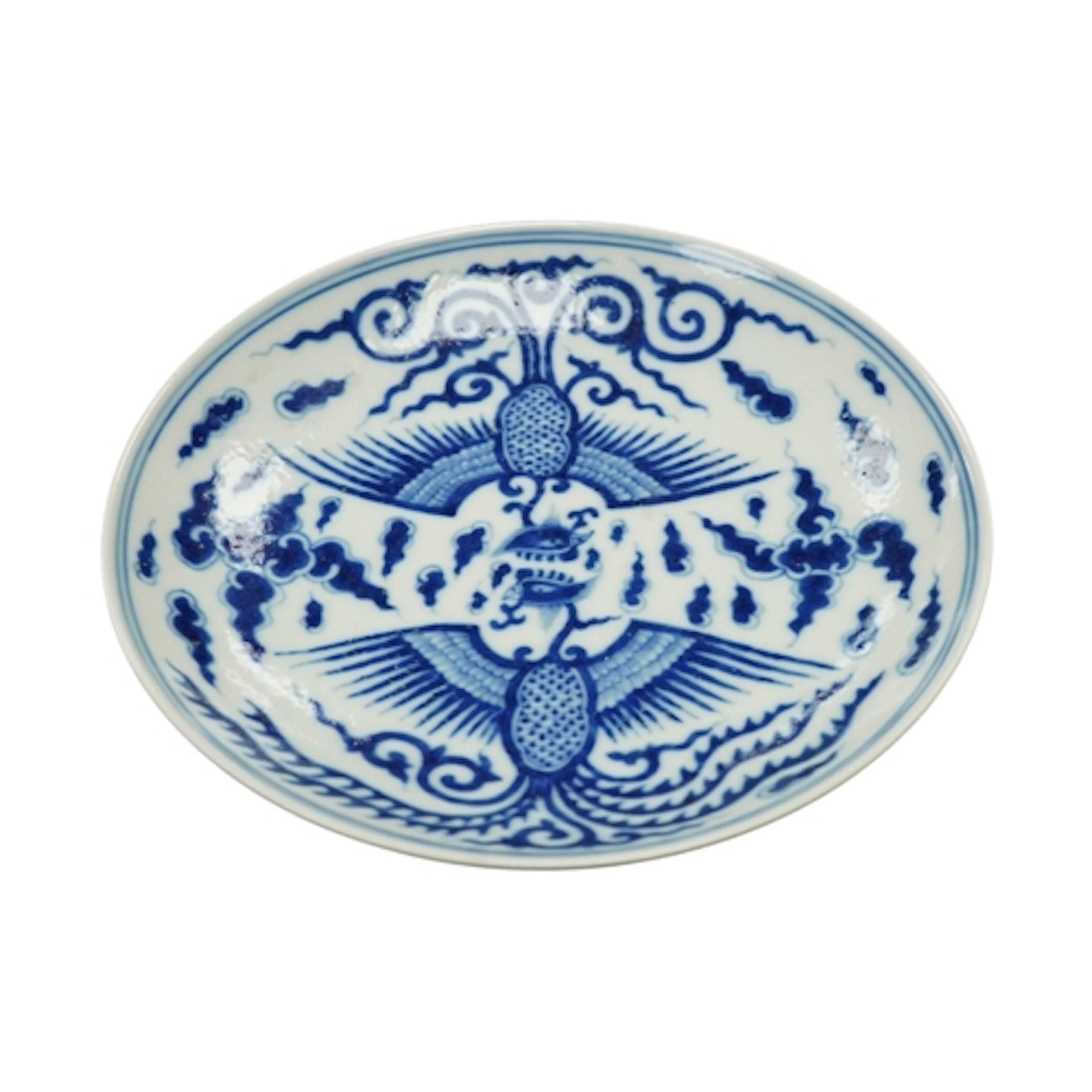 A Chinese blue and white porcelain saucer dish, decorated wi...