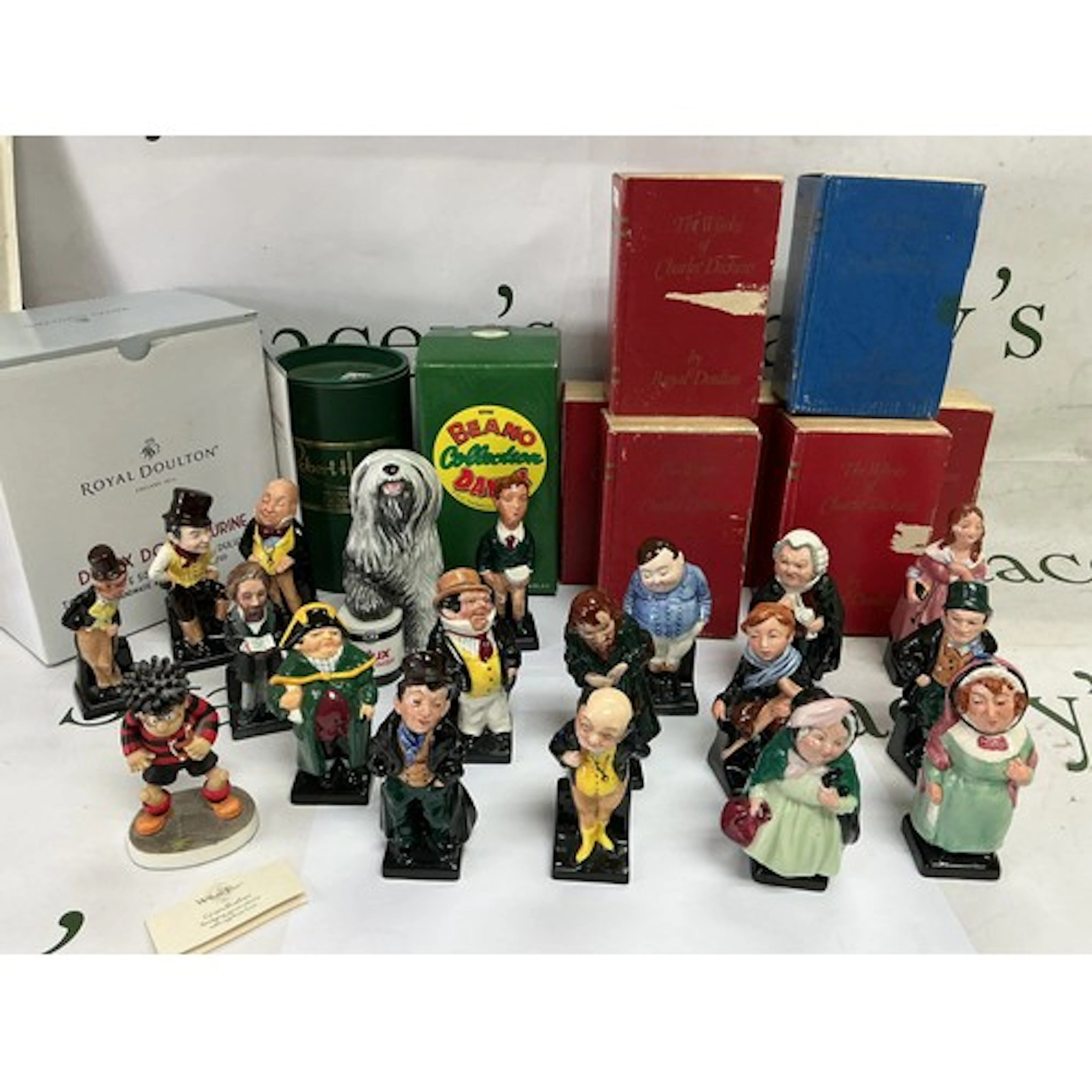 A collection of Royal Doulton Charles Dickens figures, Dulux...