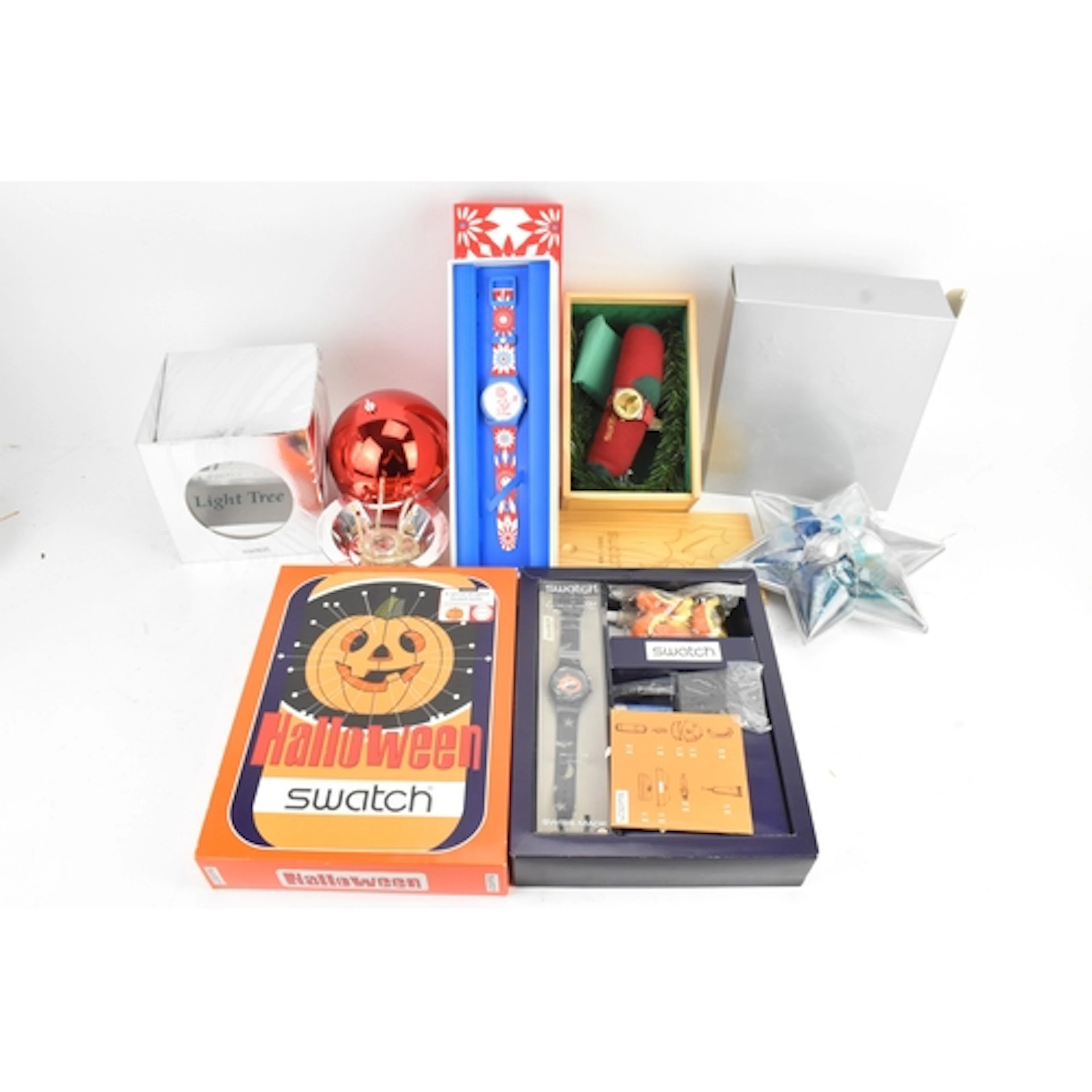 Five boxed Swatch watches to include Halloween, Light Tree, ...