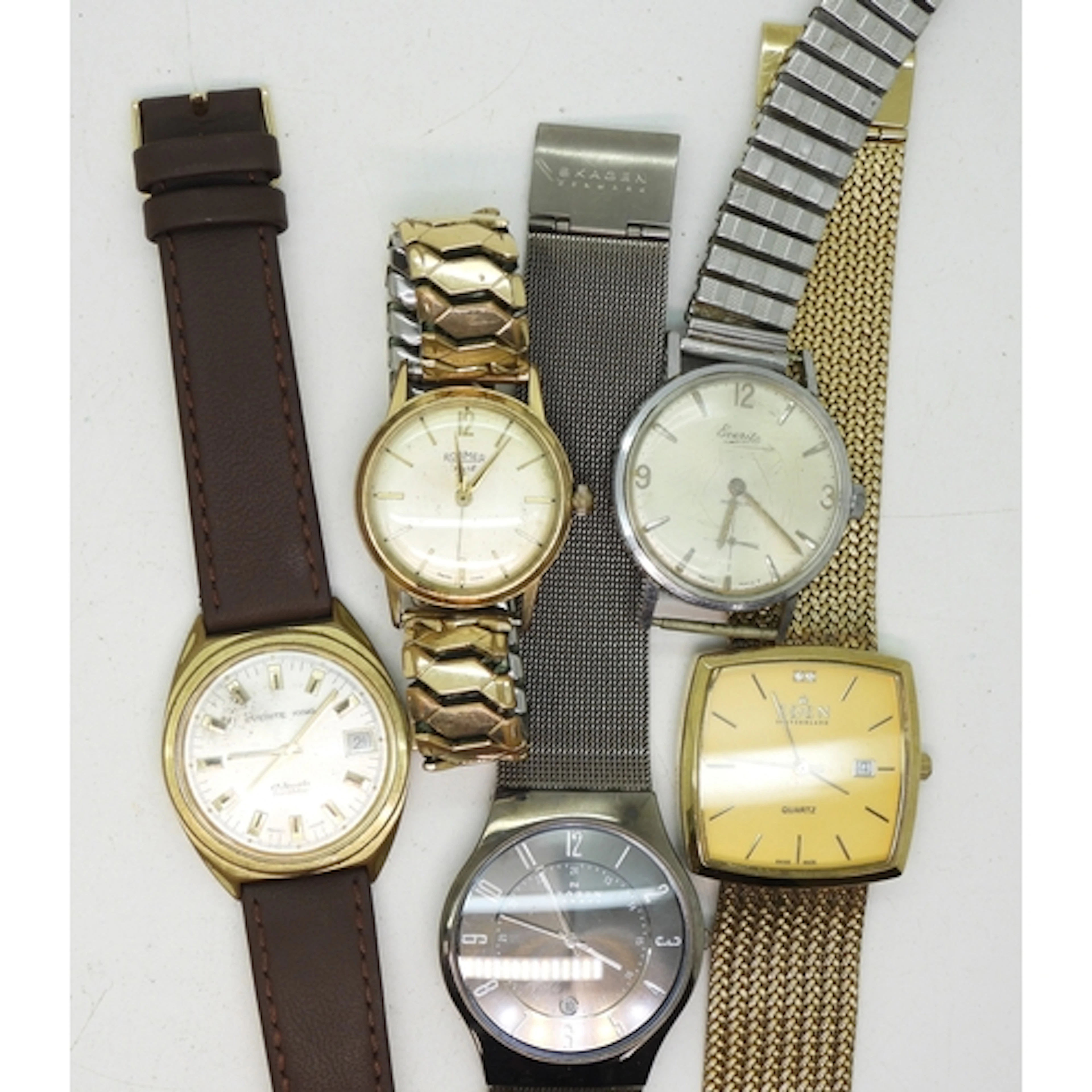 A collection of five watches to include Skagen, Everite King...
