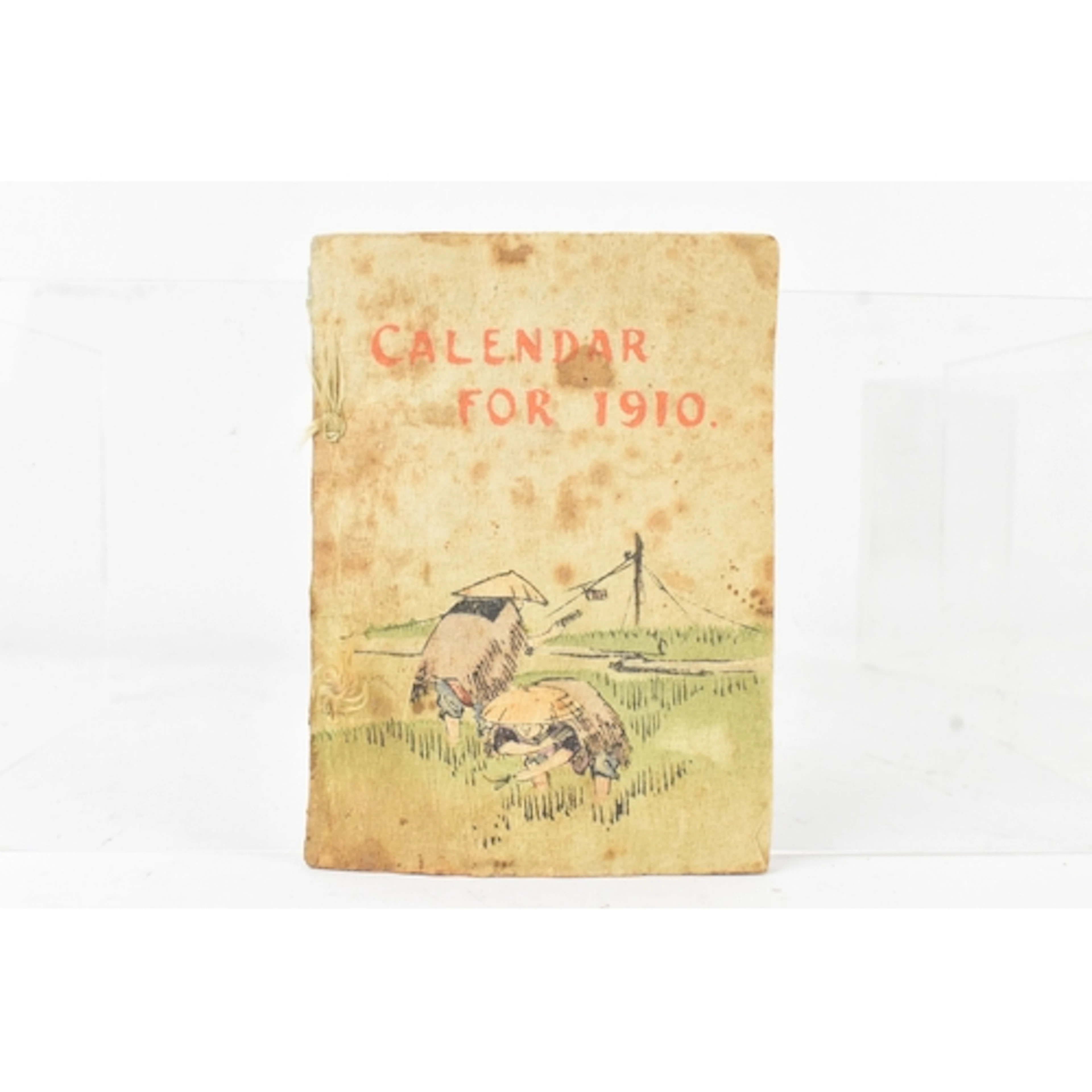 A Japanese crepe-paper calendar for 1910, published by T. Ha...