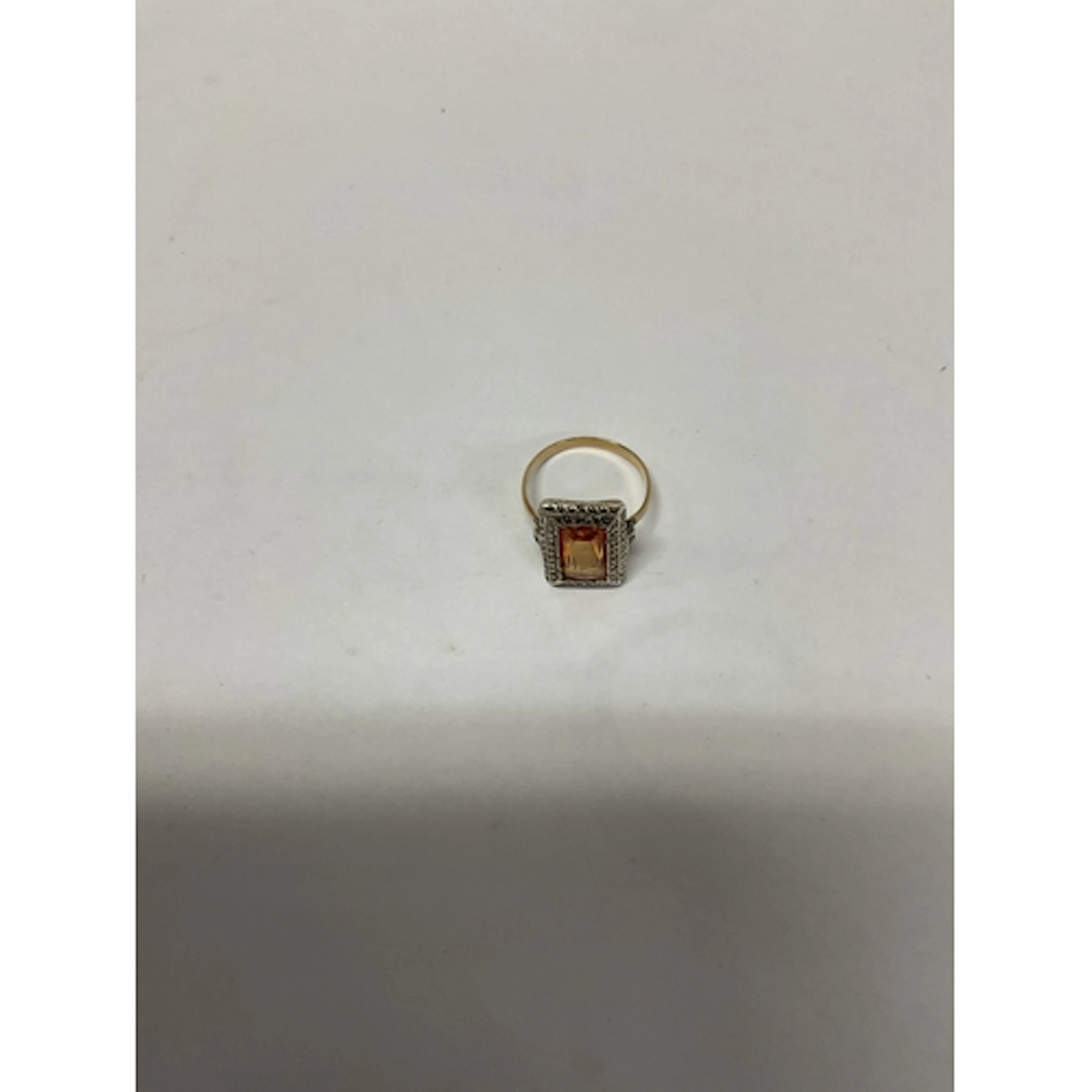 Gold ring set with silver and marcasite square surround to o...