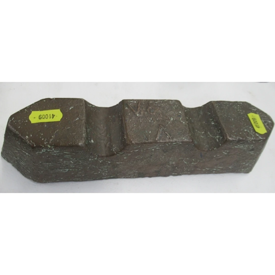 A 19th century cast copper ingot, with initials for Vivian &...