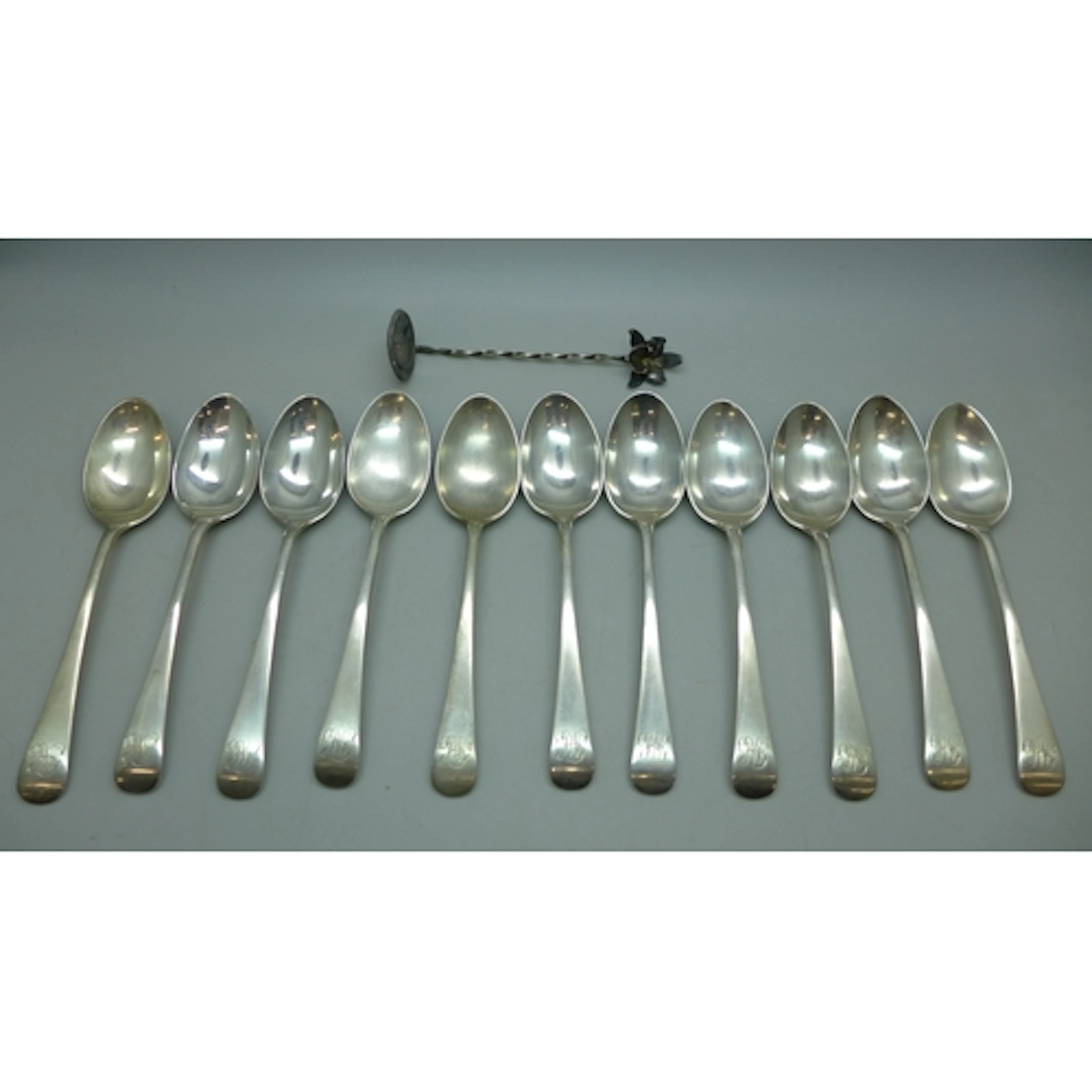A set of silver teaspoons, marked sterling silver, and a sma...
