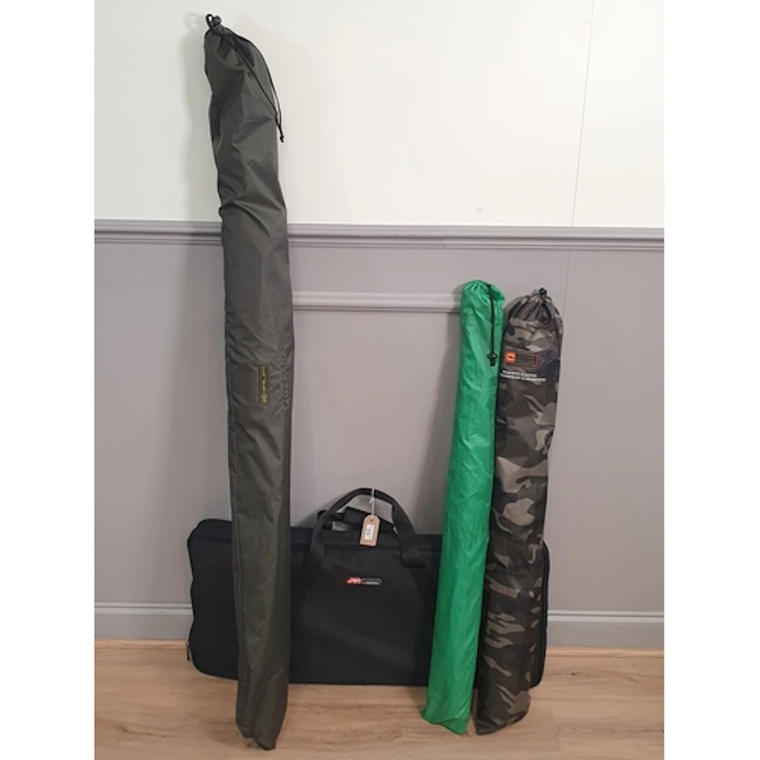 A JRC Cocoon Rod Pod, a Korum 50" Fibreglass Umbrella, a Pro...
