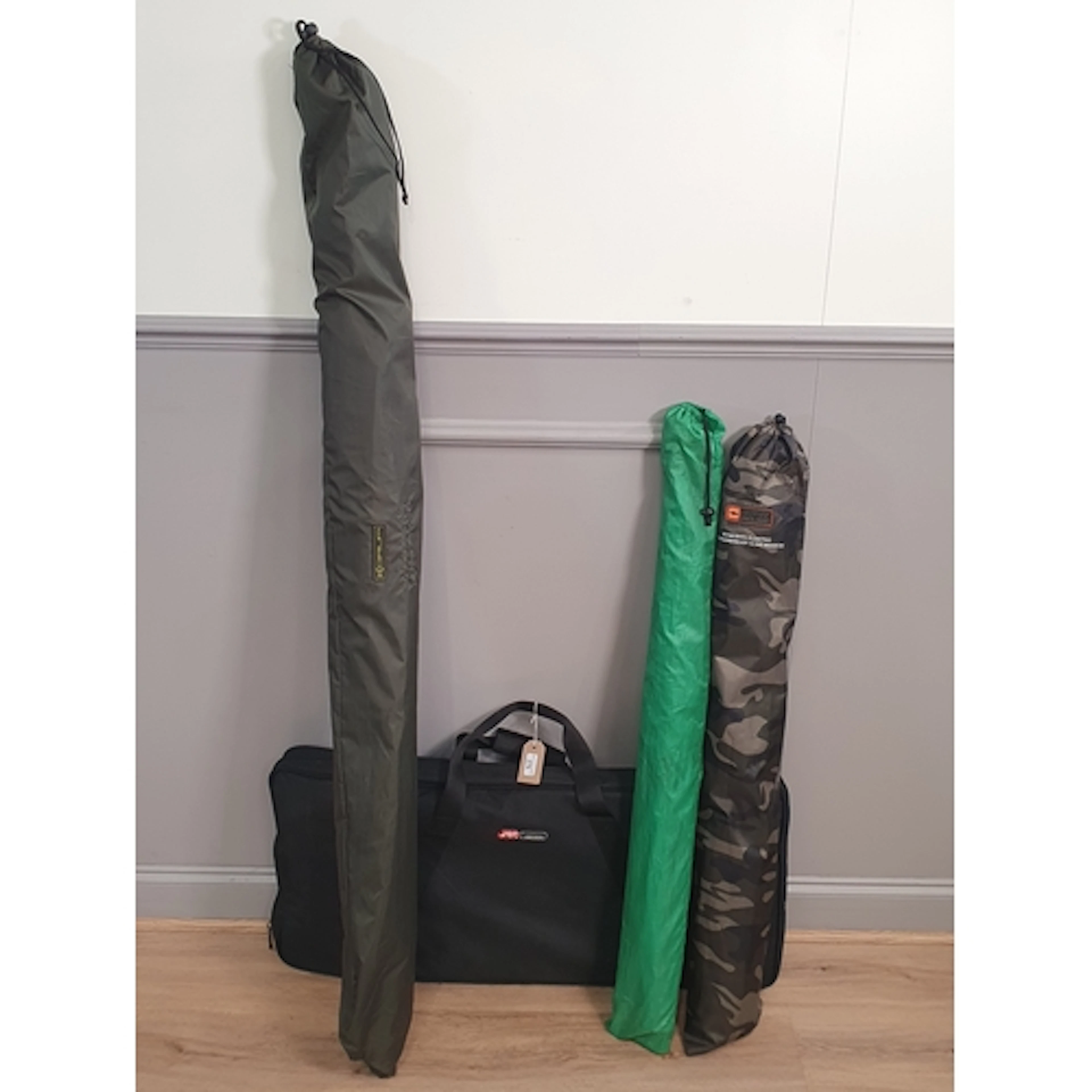 A JRC Cocoon Rod Pod, a Korum 50" Fibreglass Umbrella, a Pro...