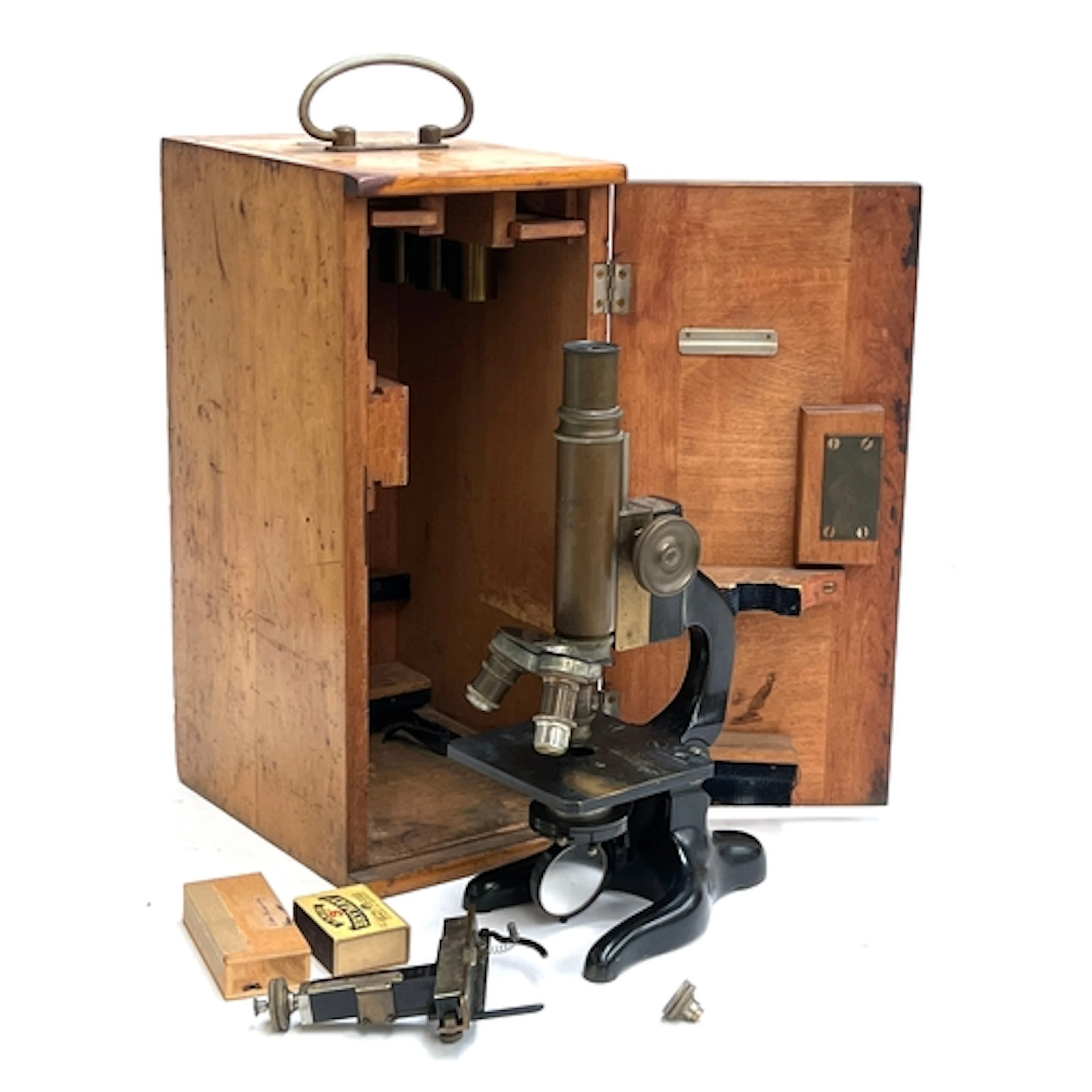 An antique German Kremp Wetzlar microscope, in wooden carry ...