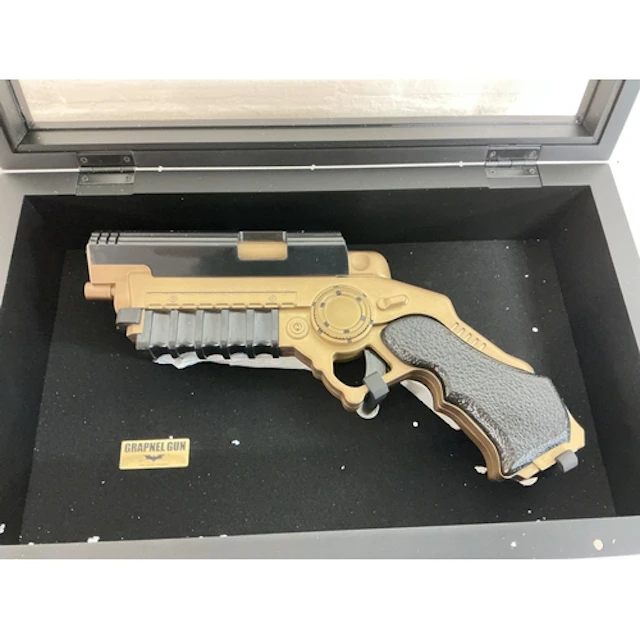 A Cased 1/1 Scale Replica Of The Dark Knights Grapnel Gun, B...