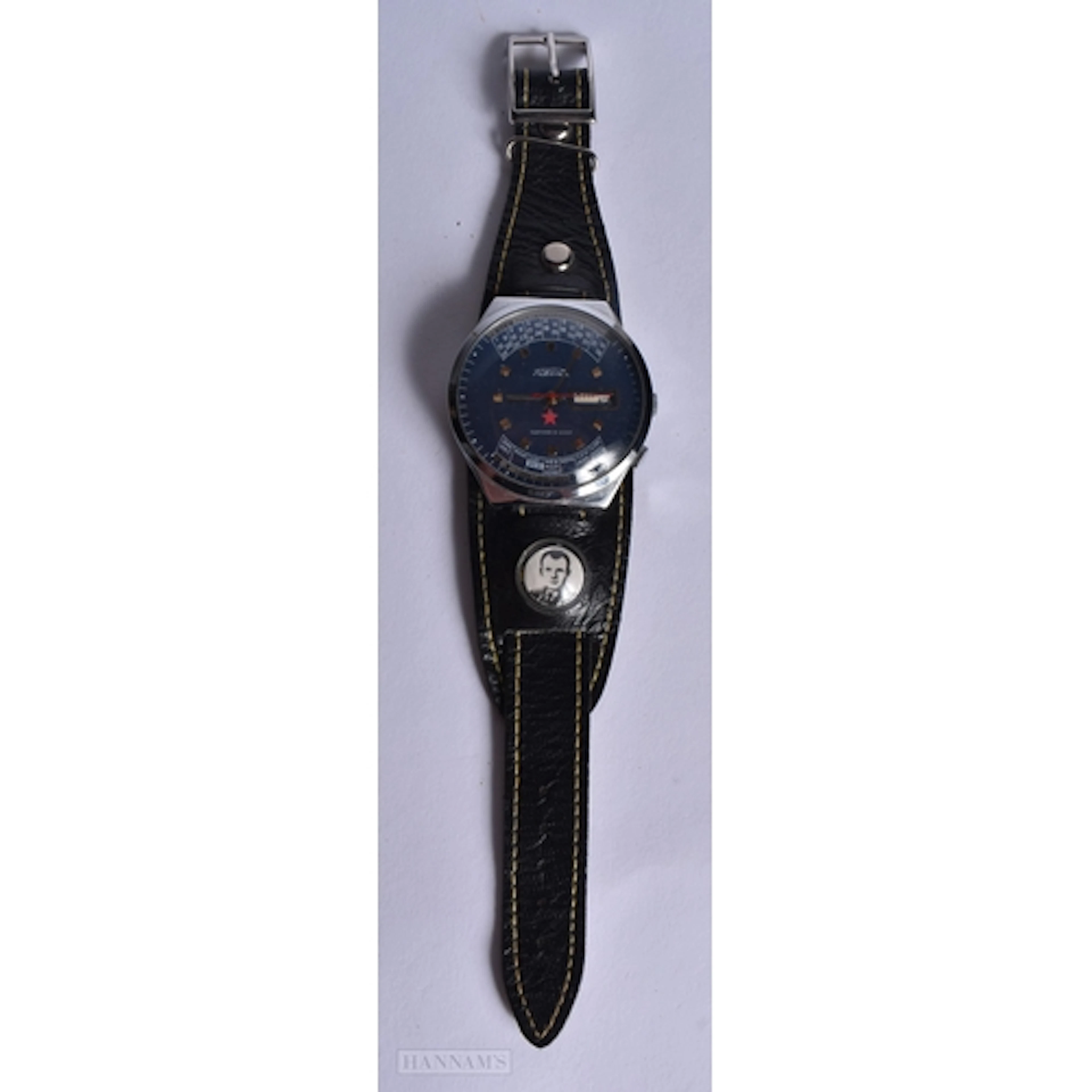 A Soviet era Raketa Cosmonaut watch 4 x 4.5cm
