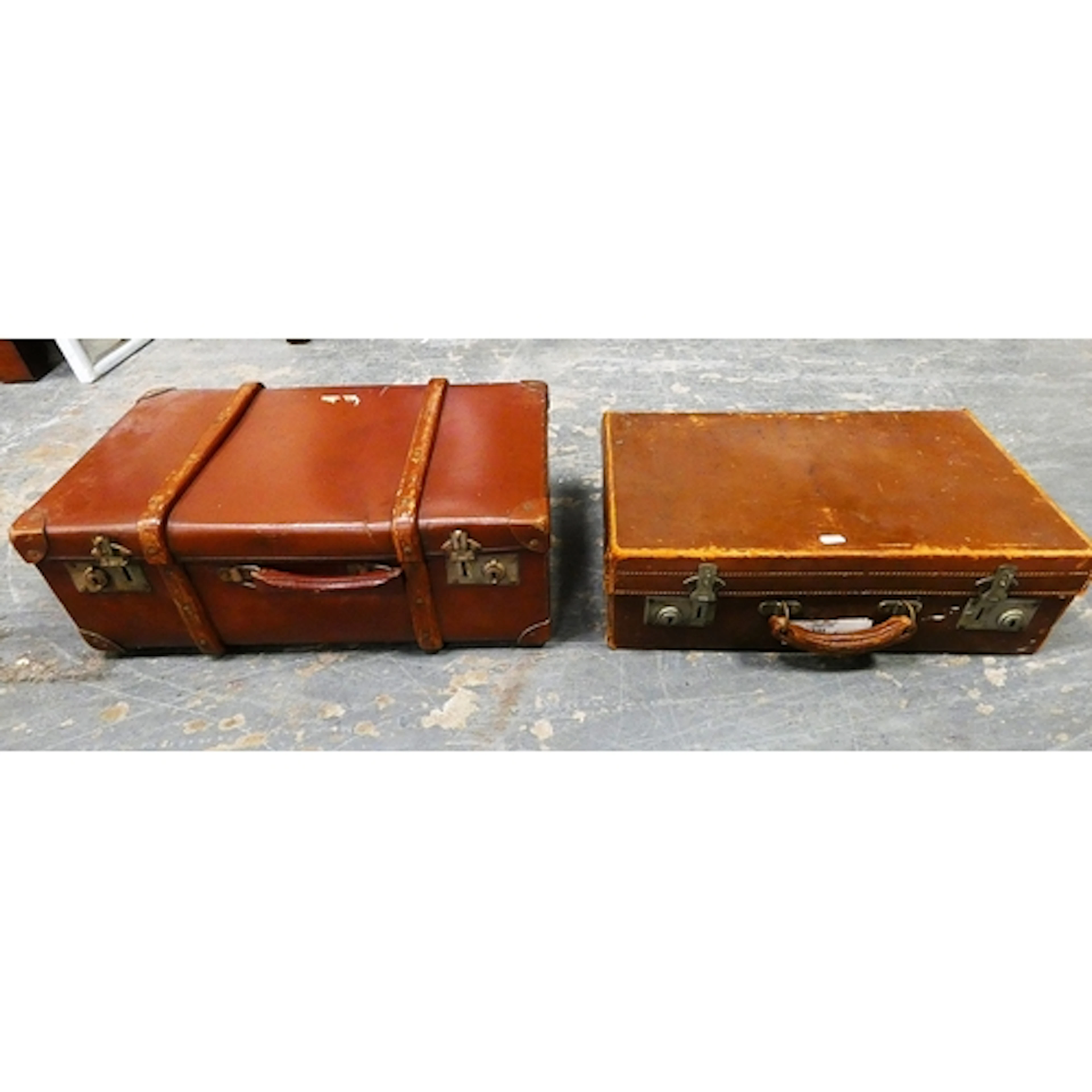Two leather suitcases.