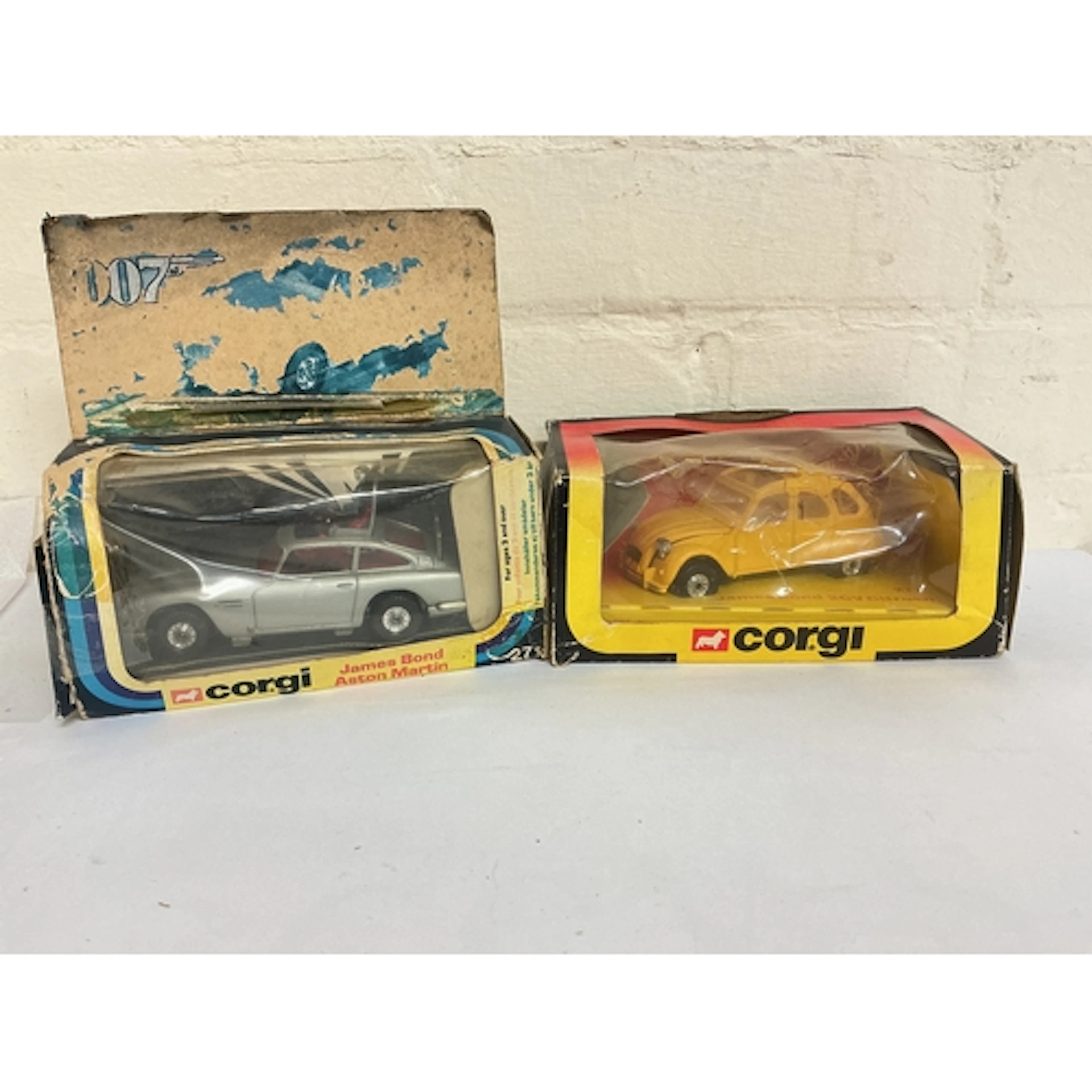 A Boxed Corgi James Bond Aston Martin #271 (Very Worn Box) &...