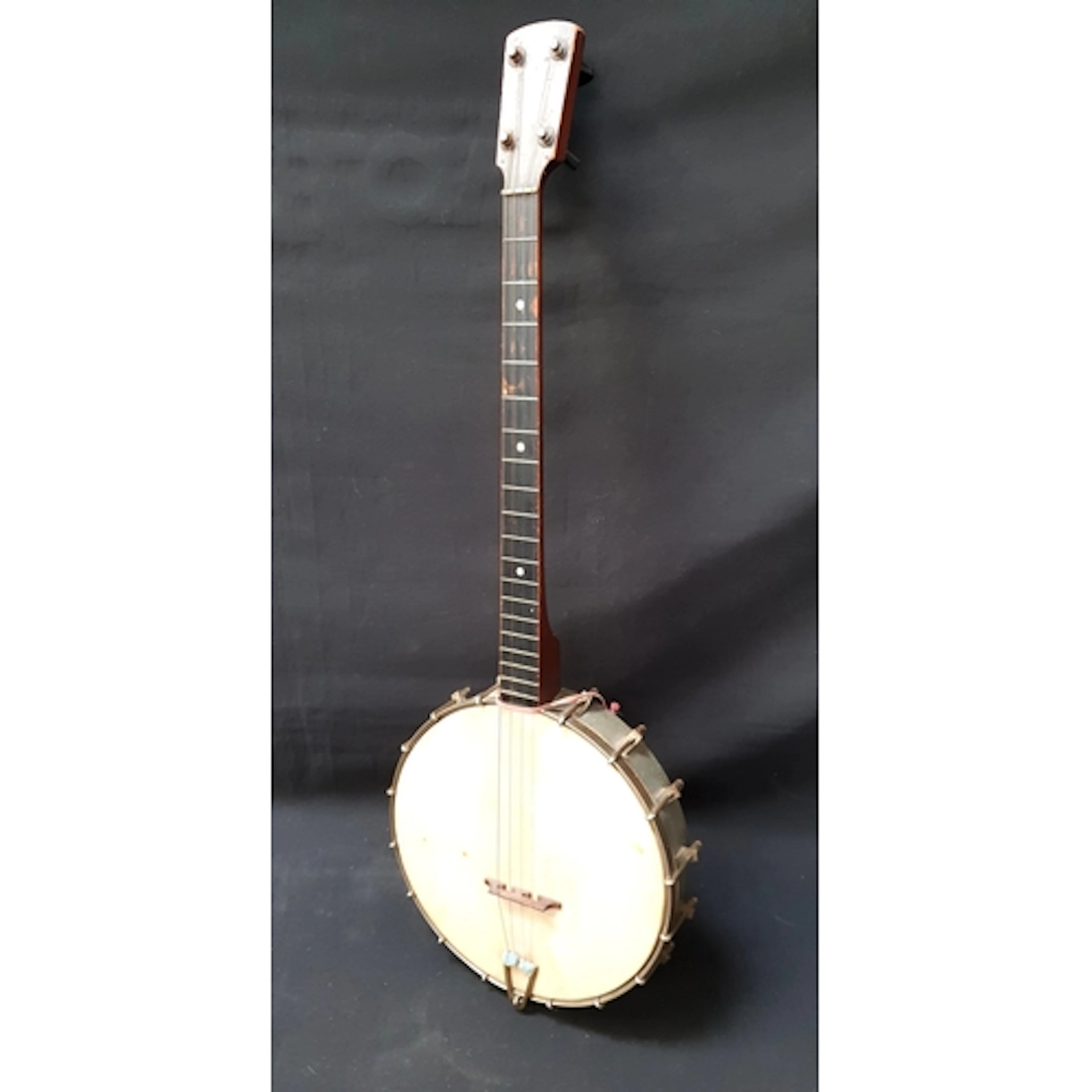 VINTAGE TENOR BANJO with four strings and mother of pearl i...