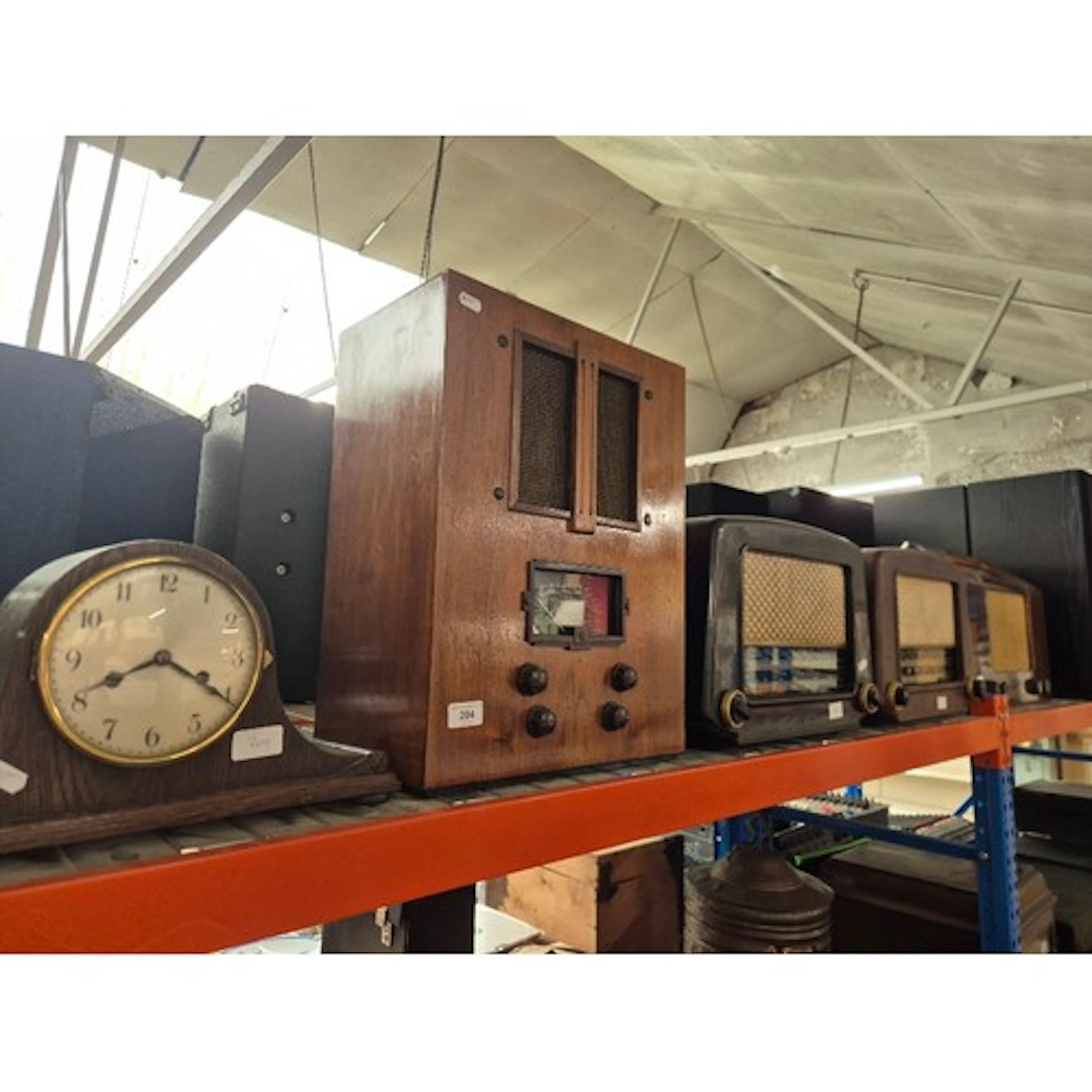 4 vintage radio sets and a mantle clock. 2 Radios are by Cos...