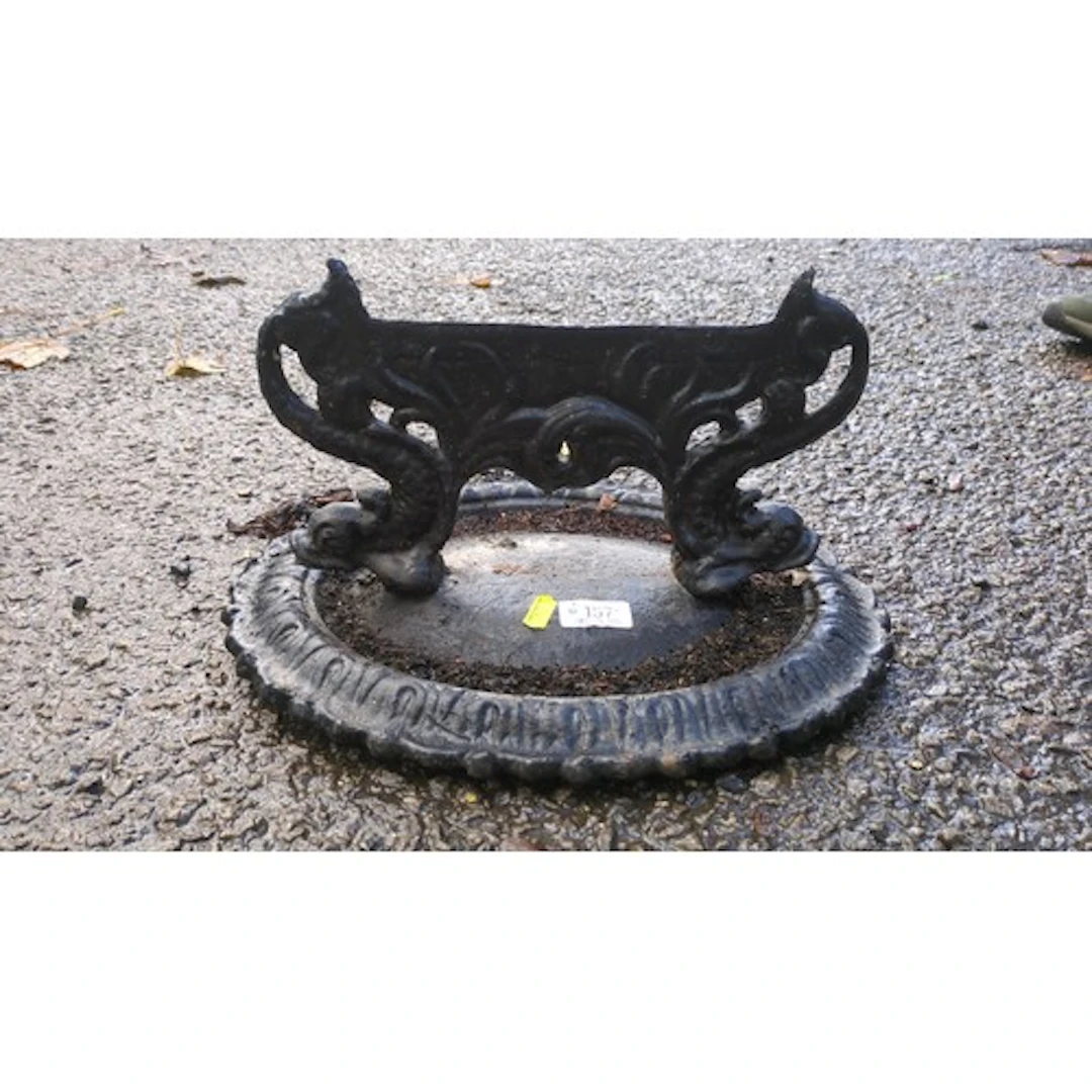 Victorian-style cast-iron boot scraper with a moulded border...