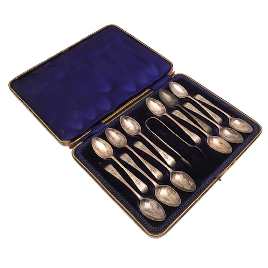 A CASED SET OF TWELVE EDWARDIAN SILVER TEASPOONS AND A PAIR ...