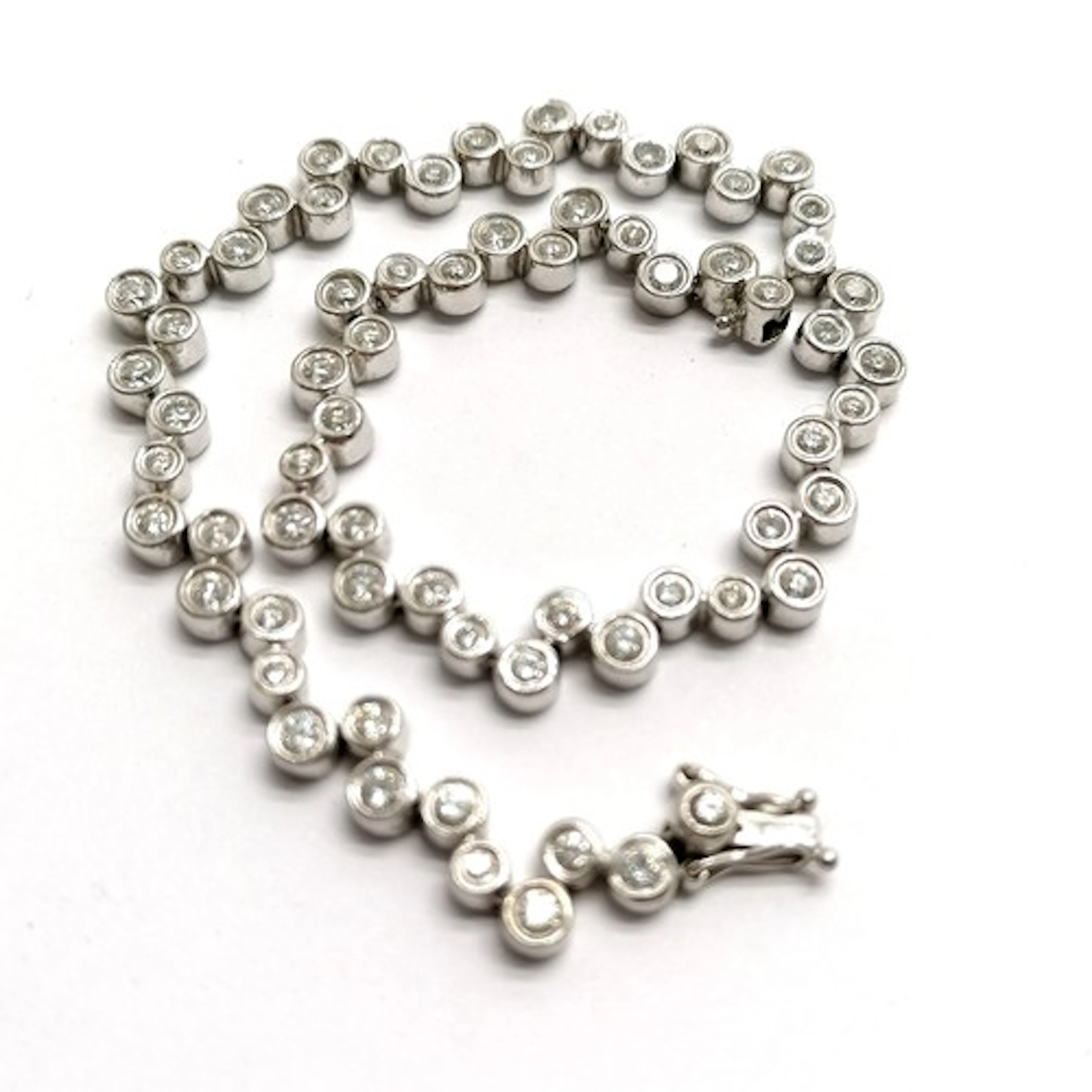18ct hallmarked white gold diamond set bracelet - 18cm & 11....