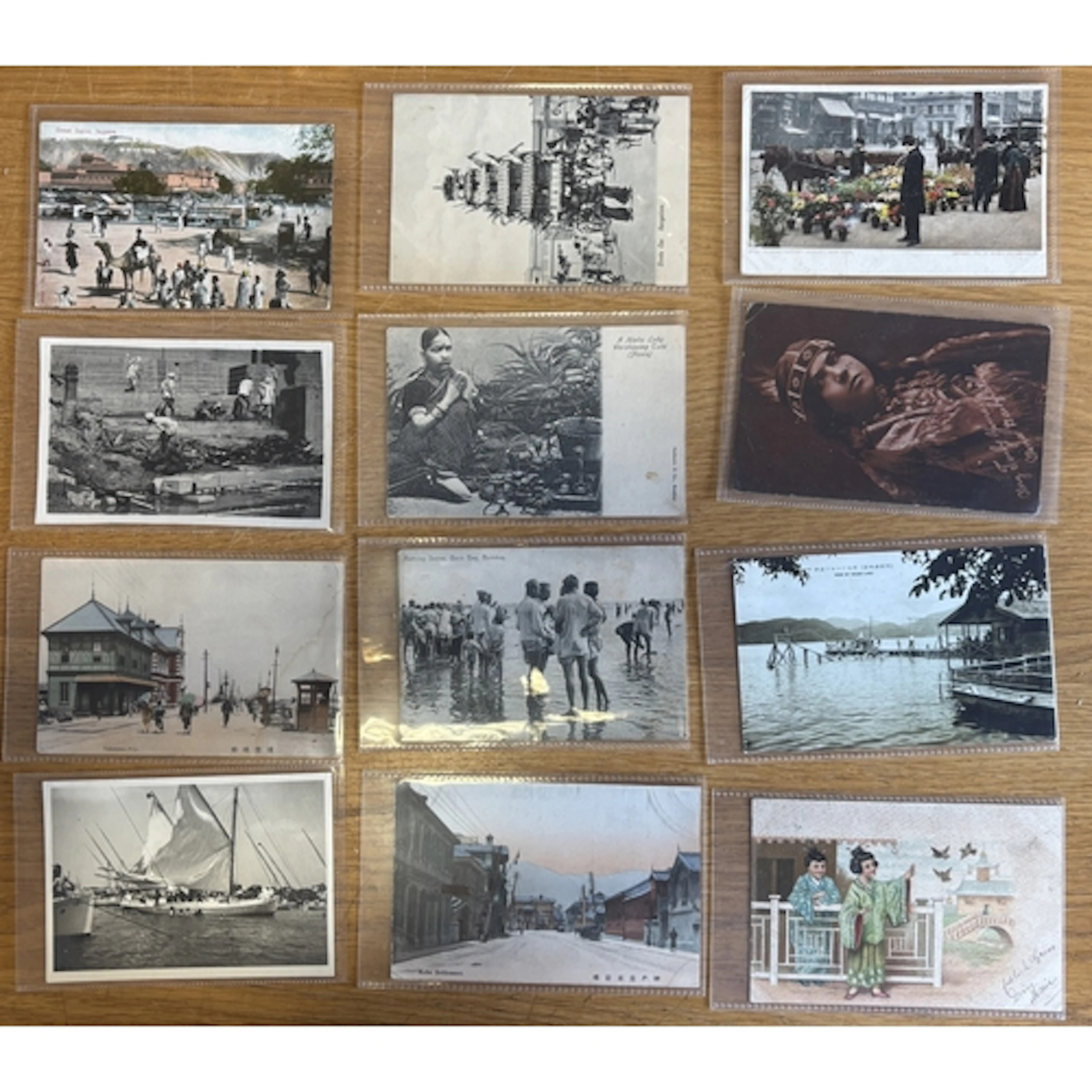 Coln. of vintage and modern world cards, with ptd, R.P's and...