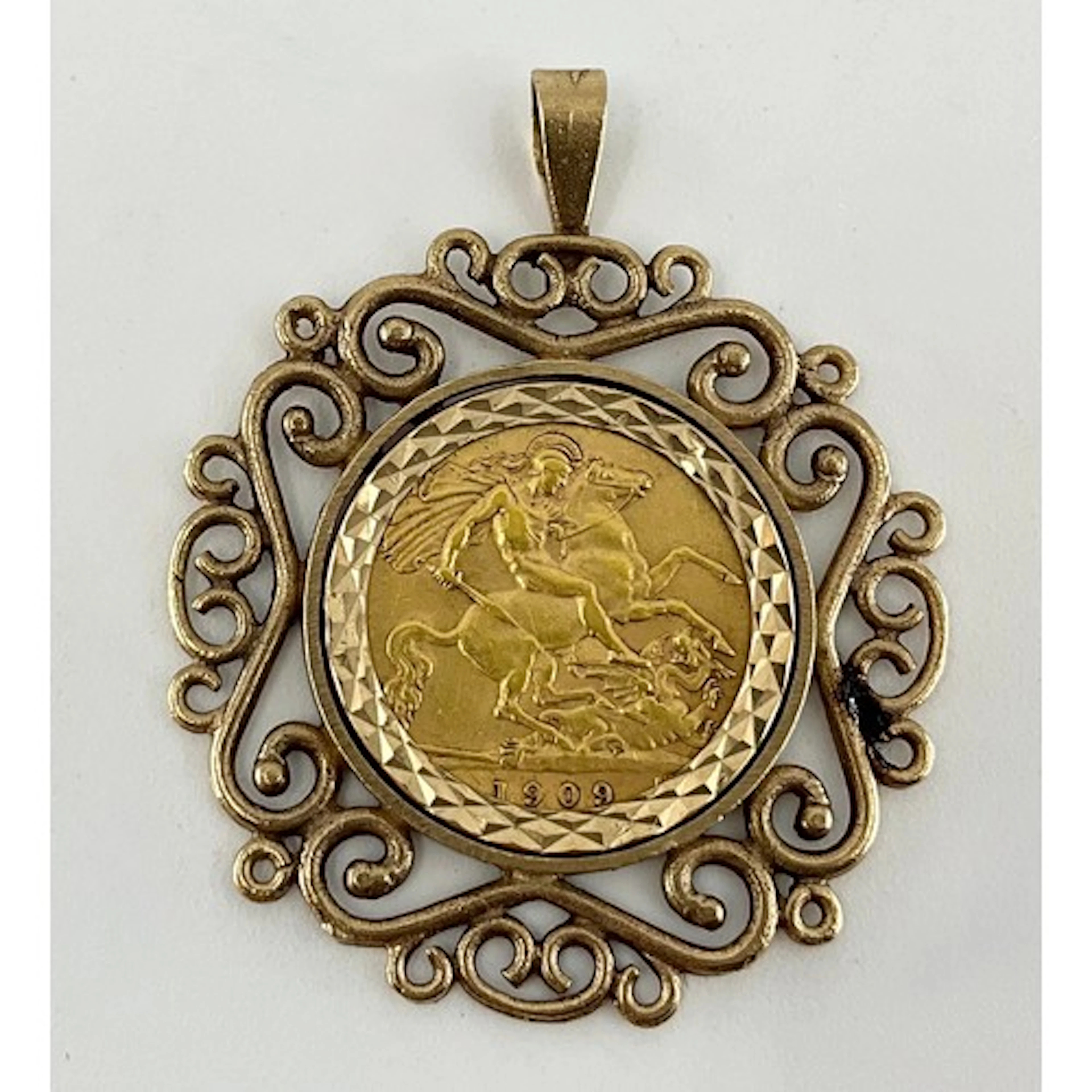 A Edward VII half sovereign pendant, 1909 London mint, later...