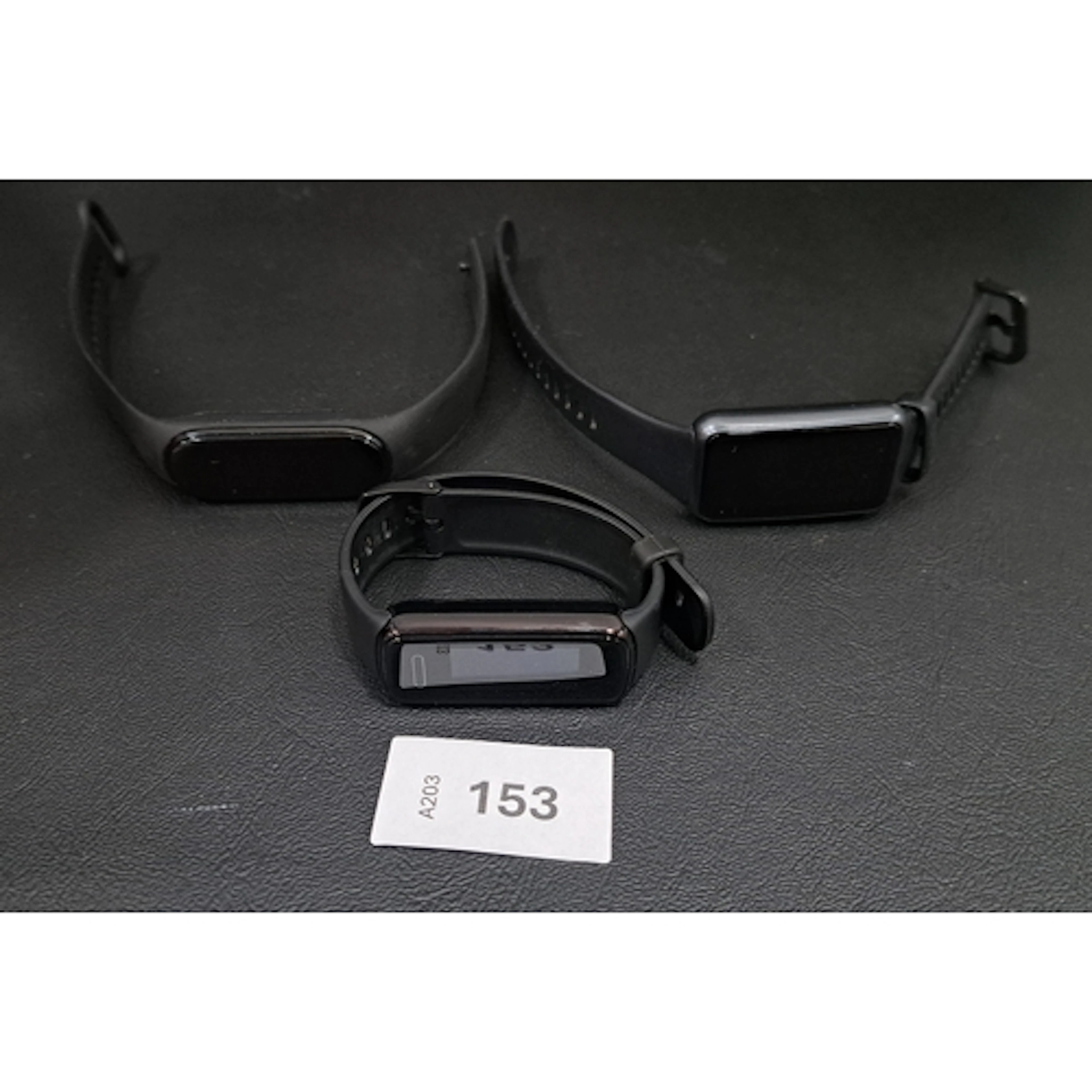 THREE FITNESS TRACKERS comprising HUAWEI LEA-B19, XIAOMI MI,...
