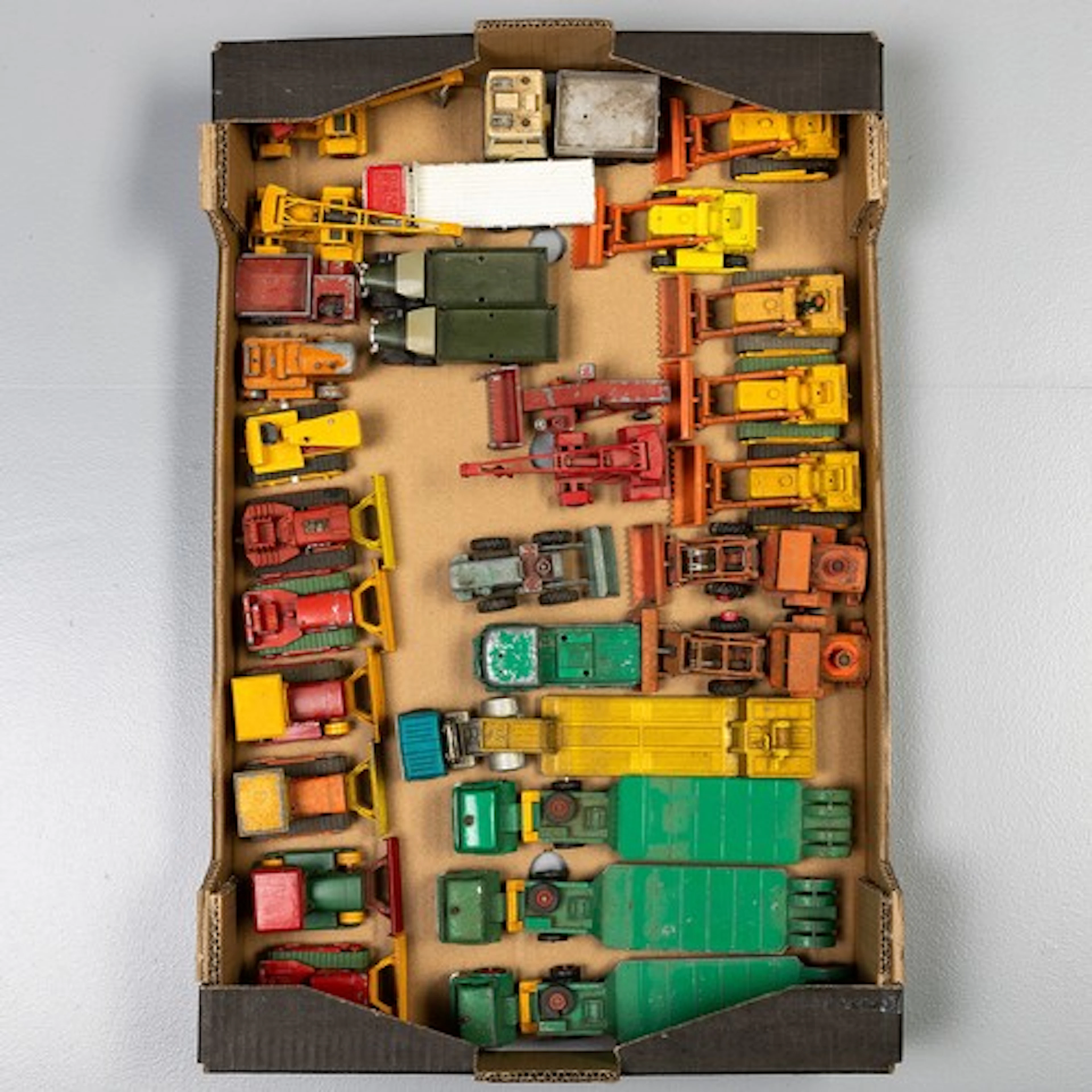 Fruit tray containing playworn Matchbox king size models to ...