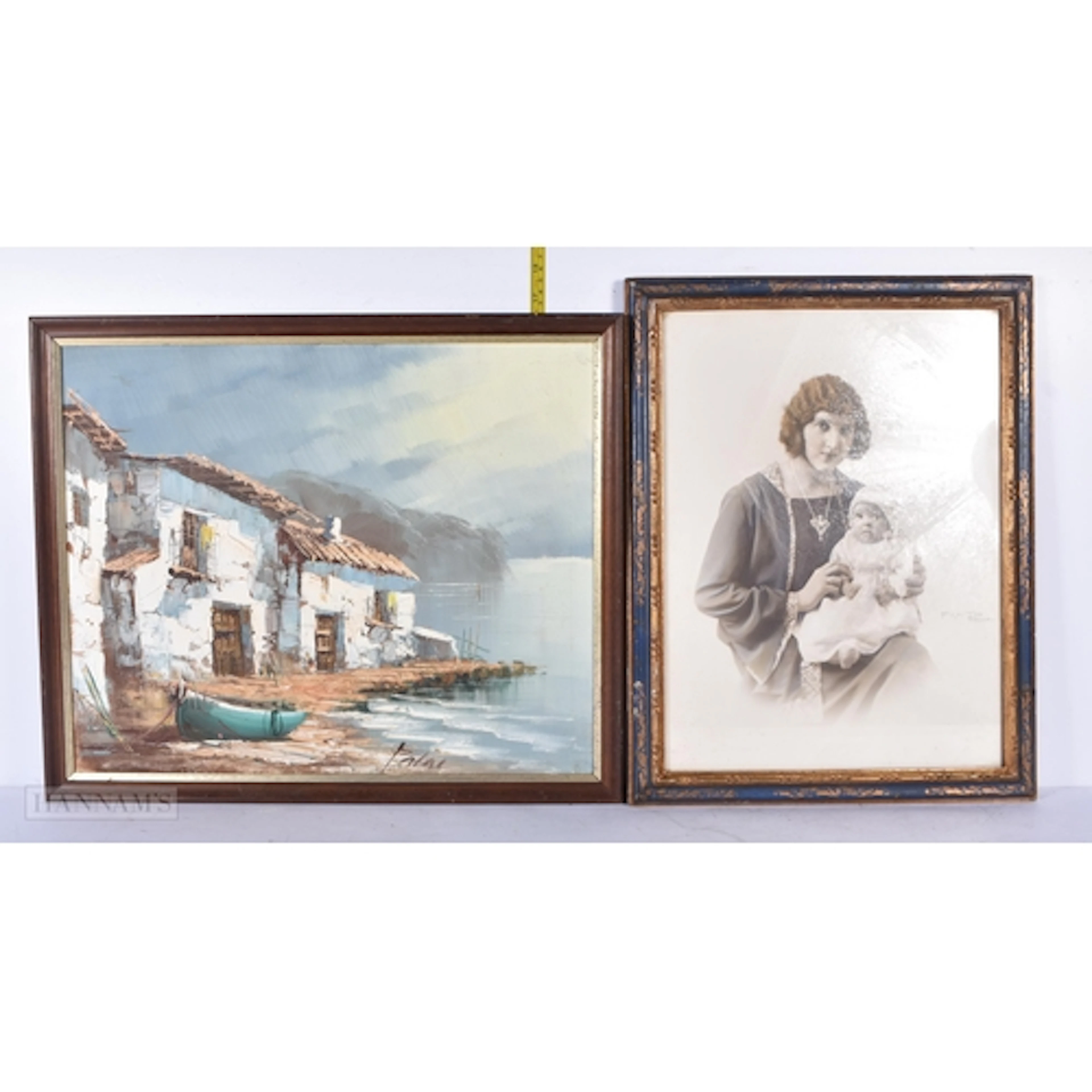 A framed antique photograph of a mother and a baby signed Pi...