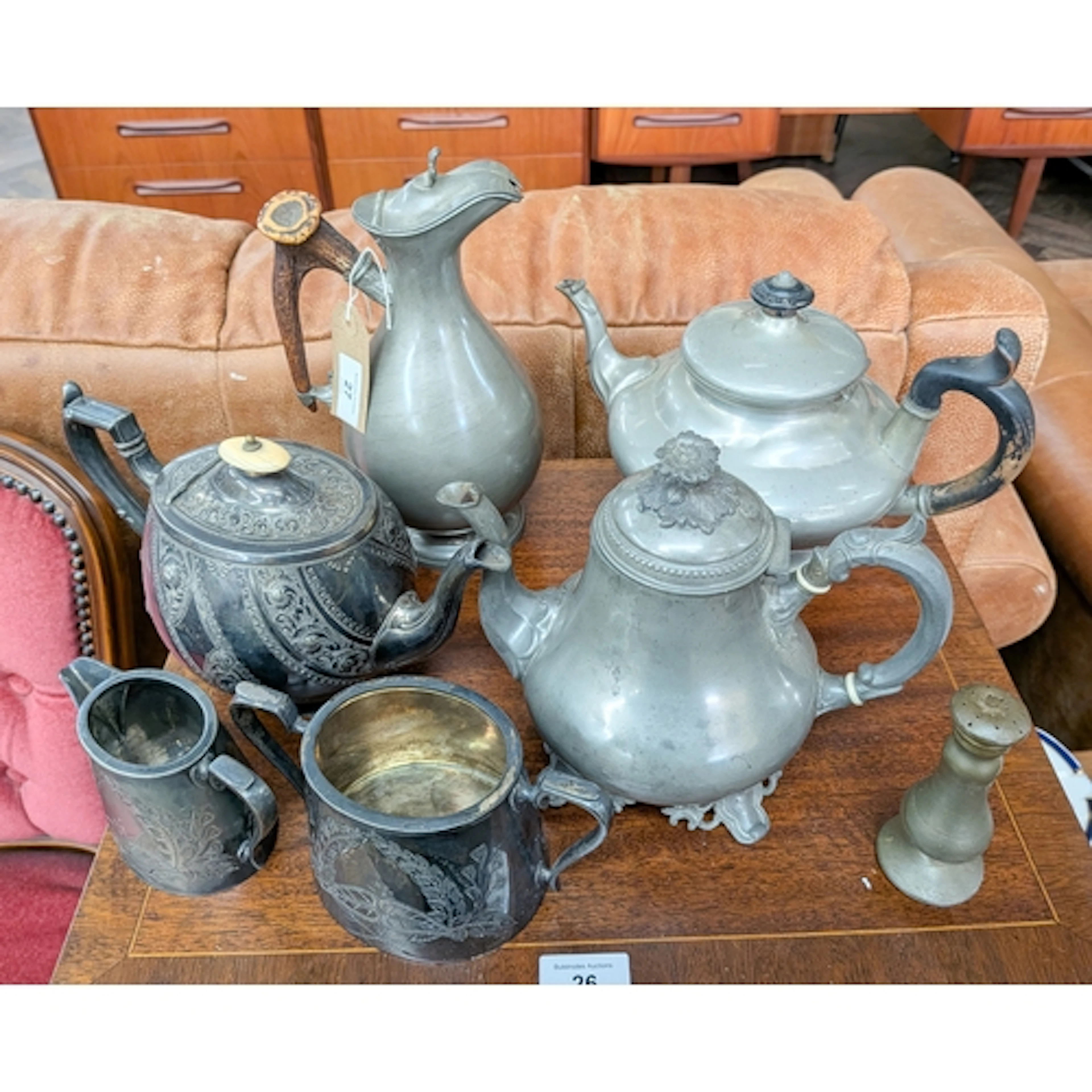 Silver plated three piece tea set, pewter teapots, water jug...