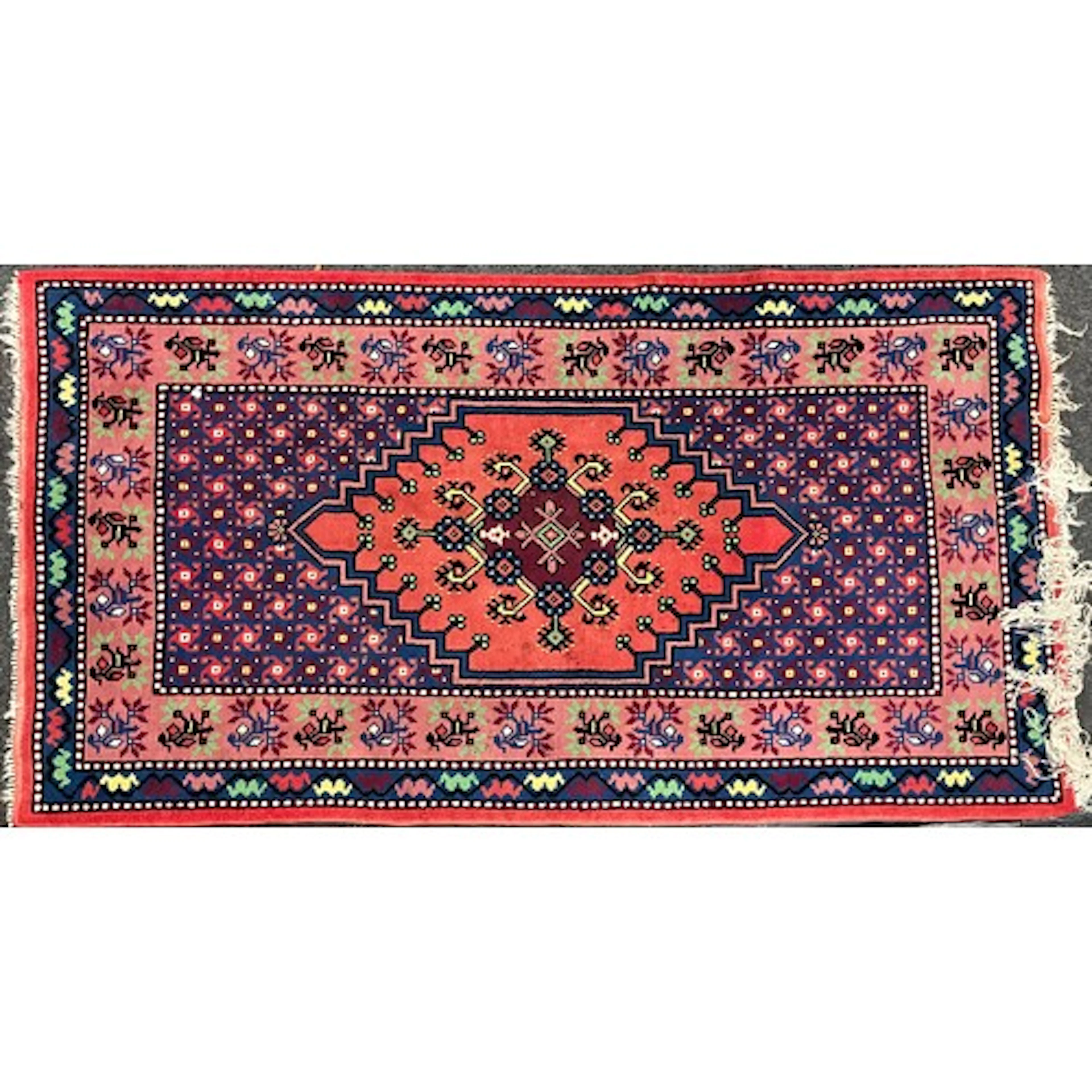 A modern Tunisian style rug, central medallion with stylised...