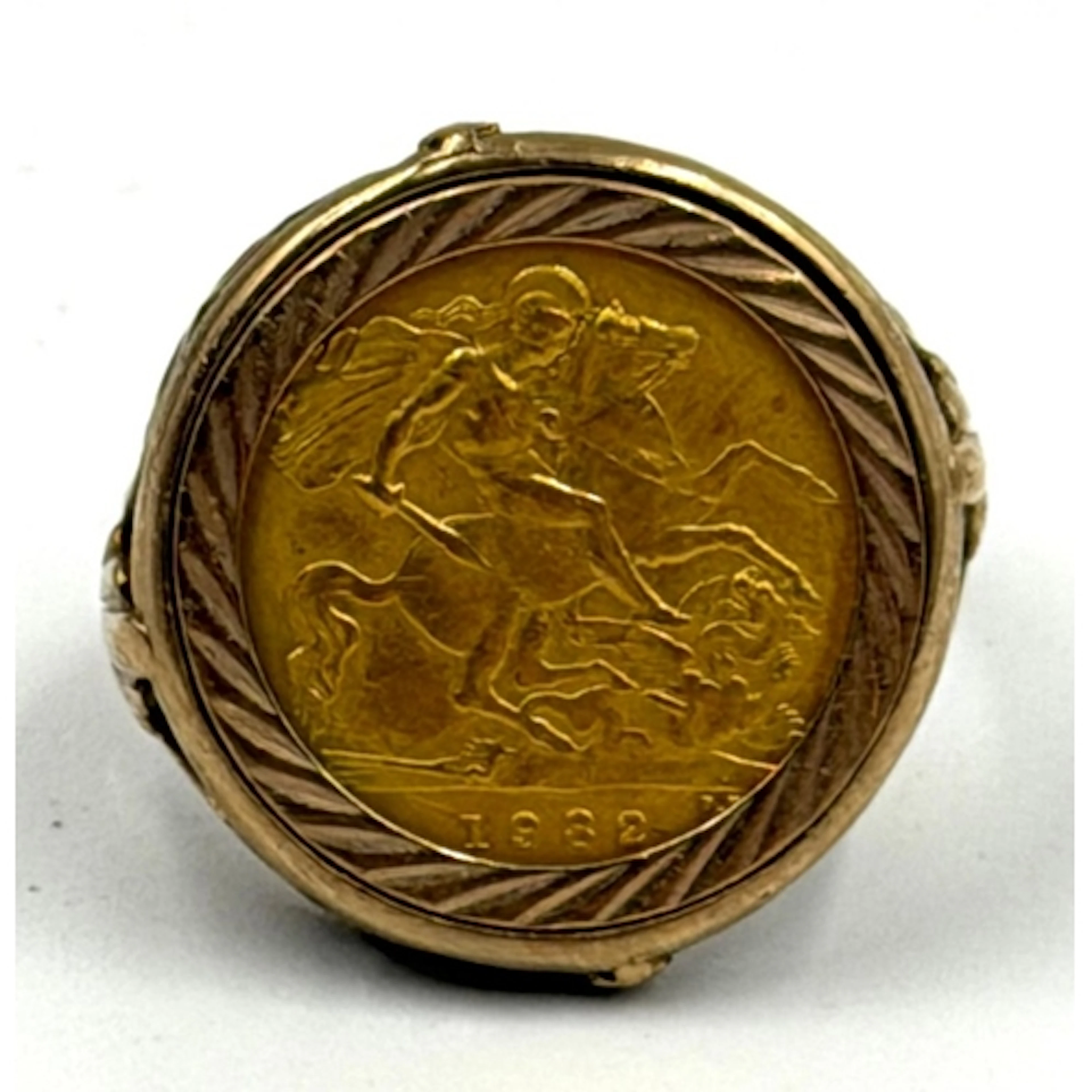 A 9ct gold set 1982 half sovereign ring, approximate combine...