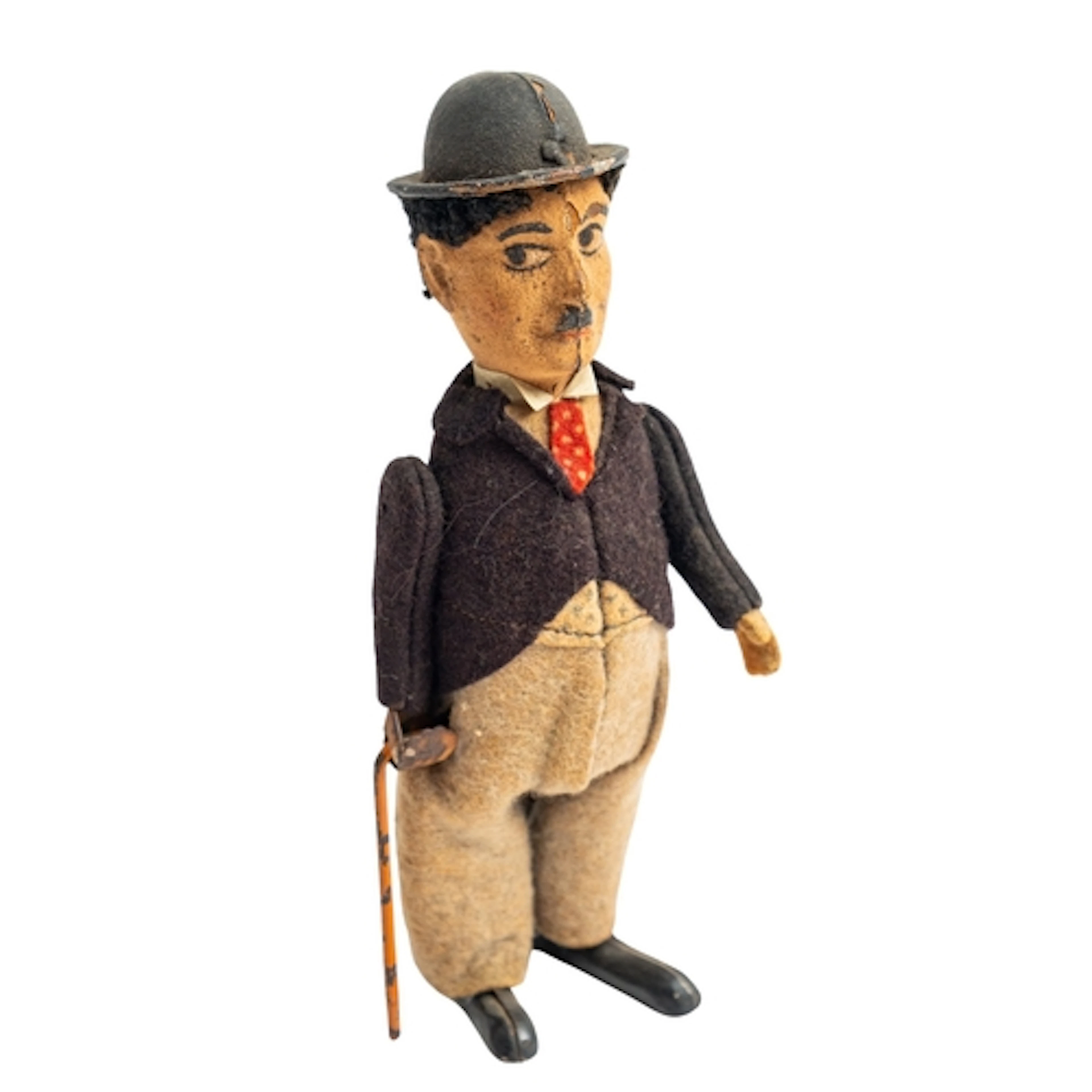 An early 20th century clockwork Charlie Chaplin figure, appl...