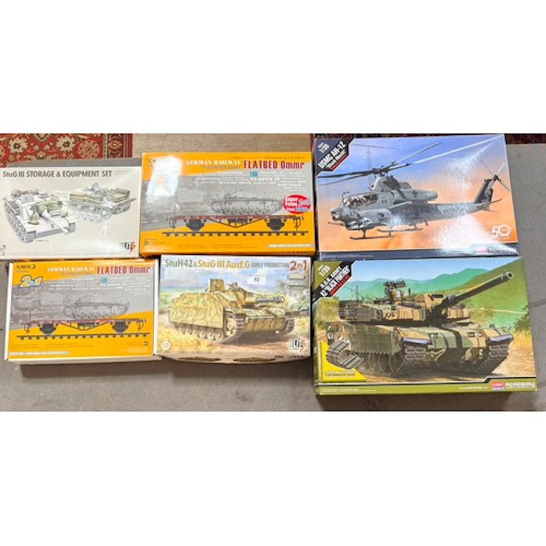 A group of four assorted military model kits (2 x Academy & ...