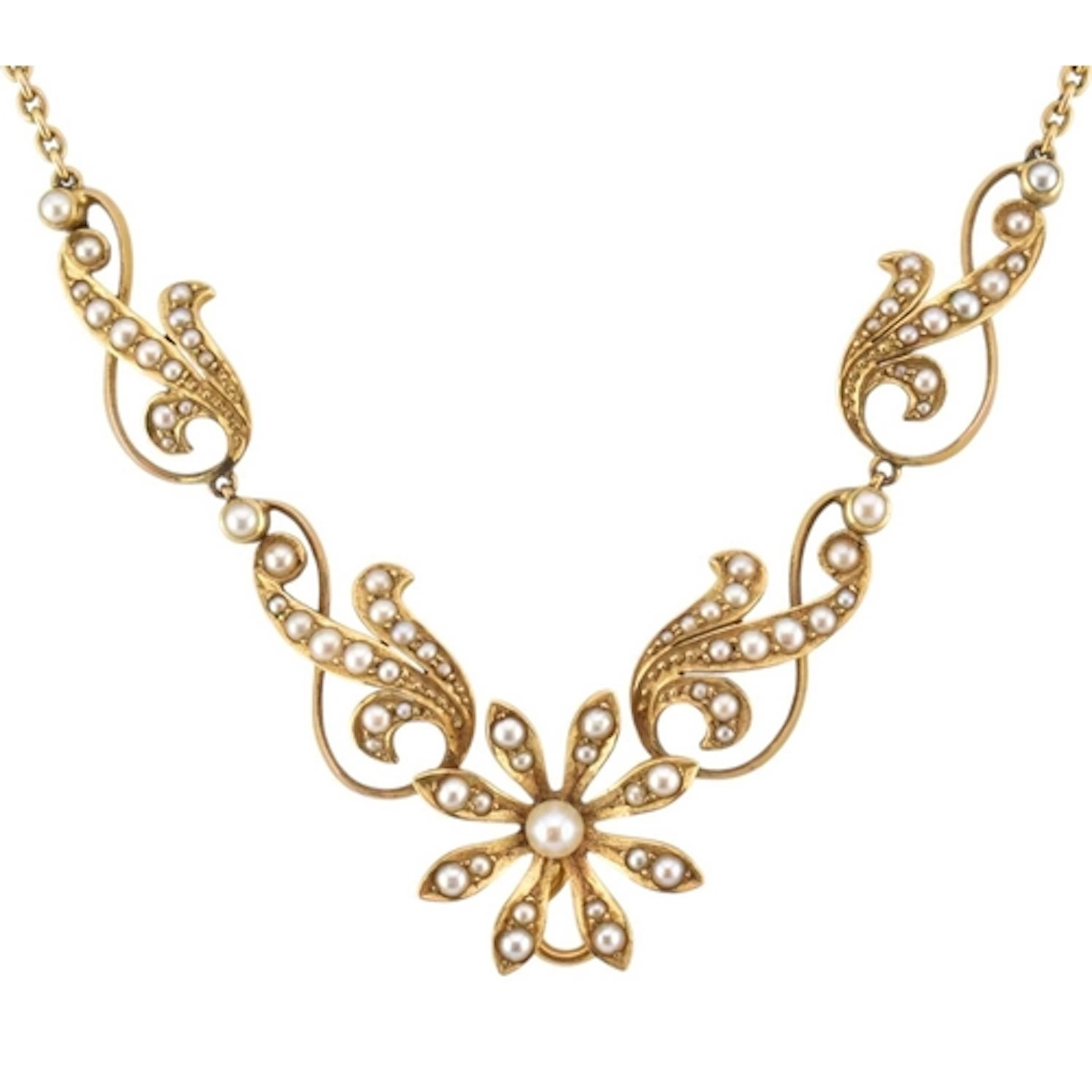 An Edwardian gold and seed pearl floral garland necklace. A ...