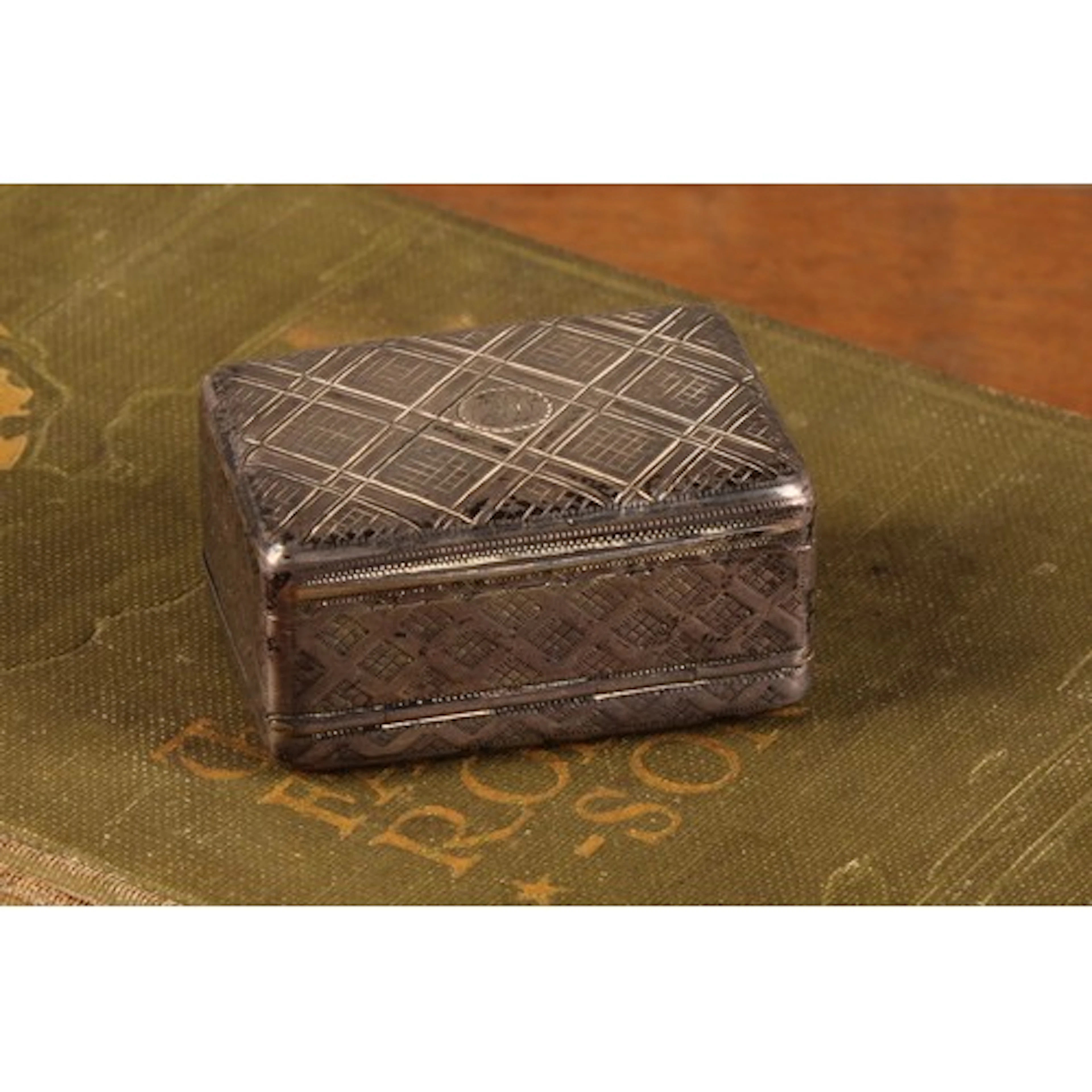 A George III silver rounded rectangular pocket nutmeg grater...